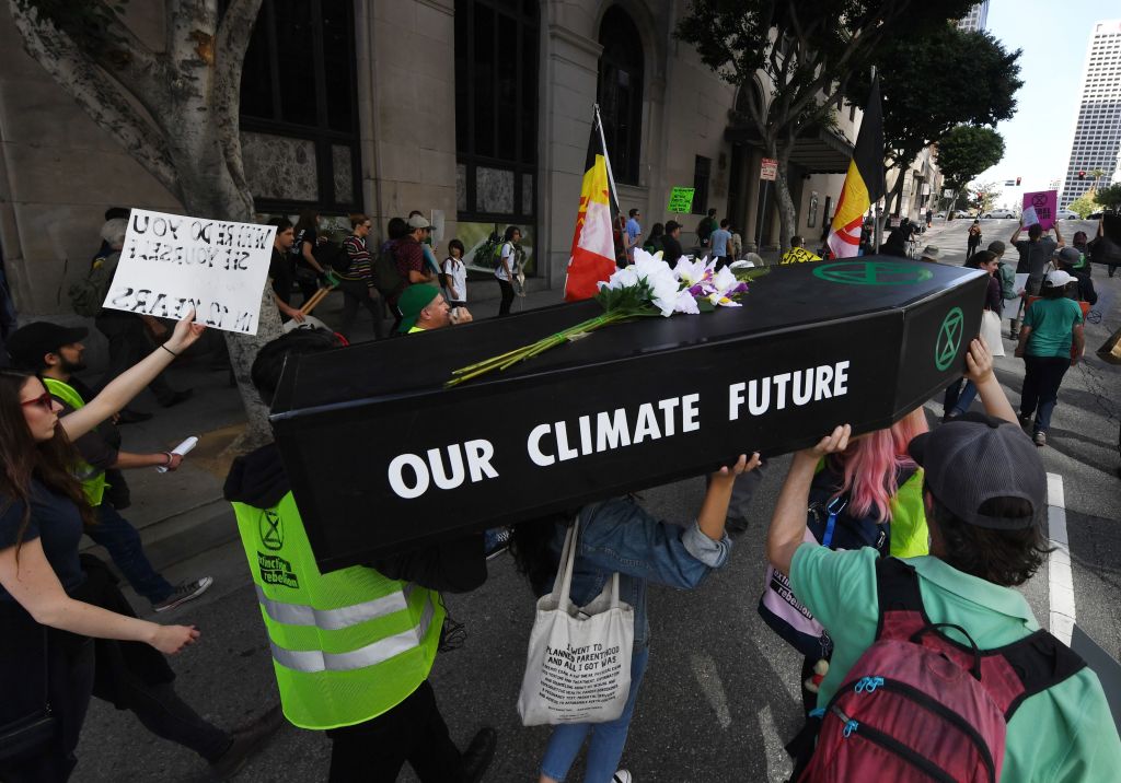 Activists march for climate action in Los Angeles, California in January. (CREDIT: Mark RALSTON / AFP / Getty Images)