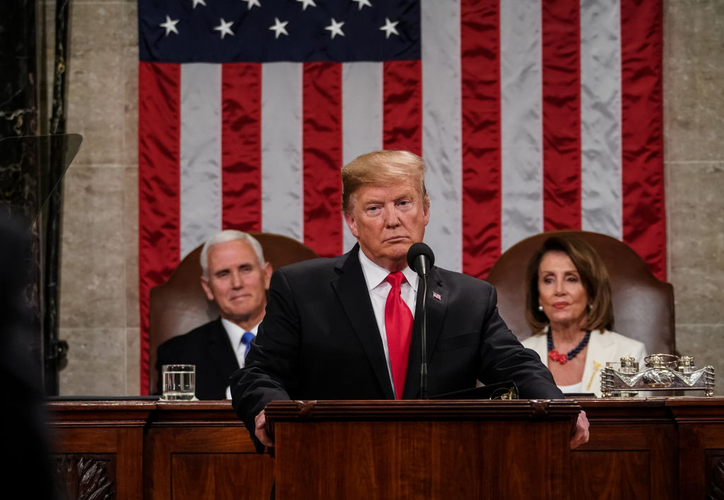 President Donald Trump used baseless fear-mongering in his State of the Union speech to push for a border wall, drudging up favorite talking points with no proof to back up his wild claims. (Photo credit: Doug Mills-Pool/Getty Images)
