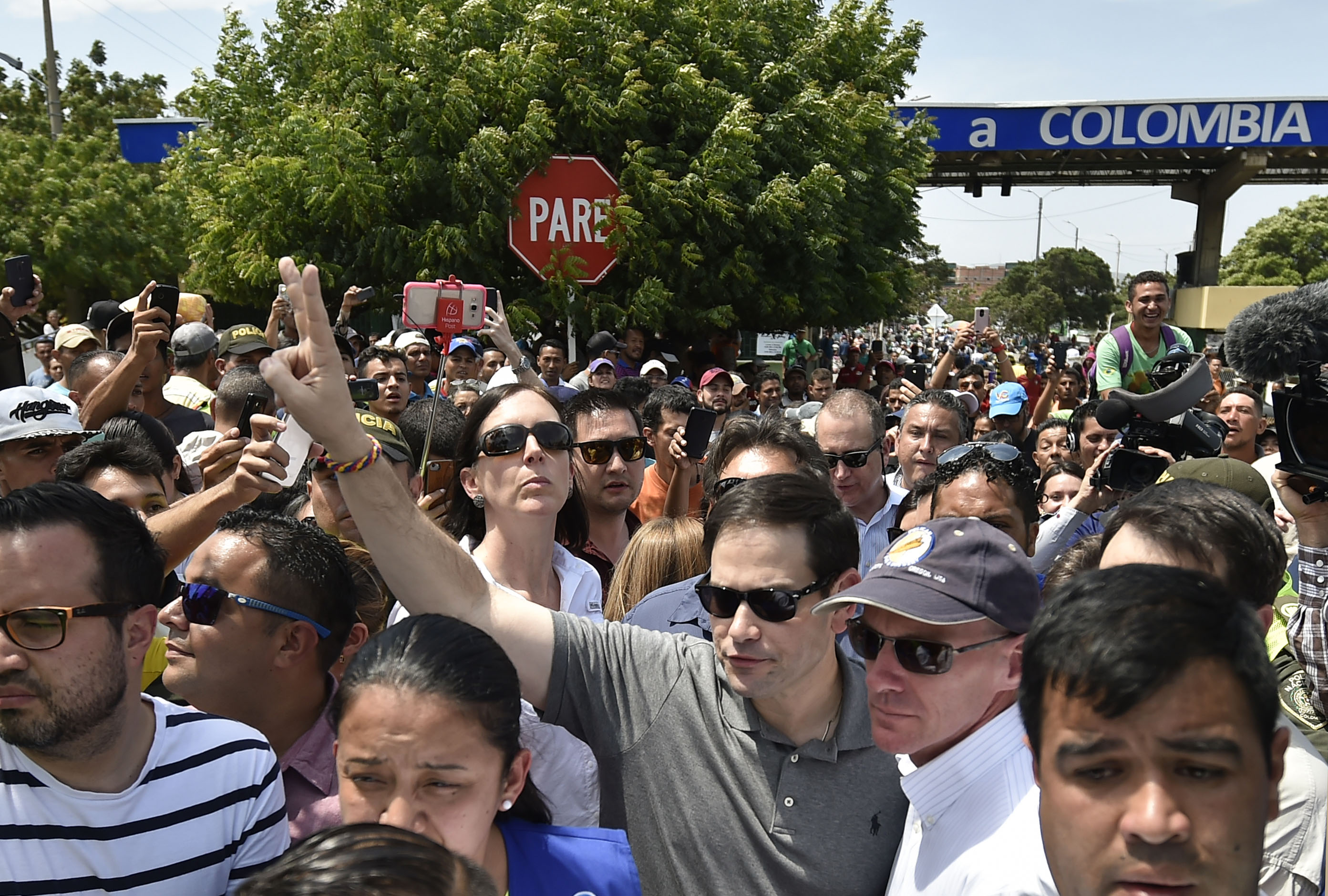 Sen. Marco Rubio flashes the V-sign as he walks at the Simon Bolivar international bridge in Cucuta, Colombia, border with San Antonio de Tachira, Venezuela on February 17, 2019. CREDIT: Luis Robayo/AFP/Getty Images.