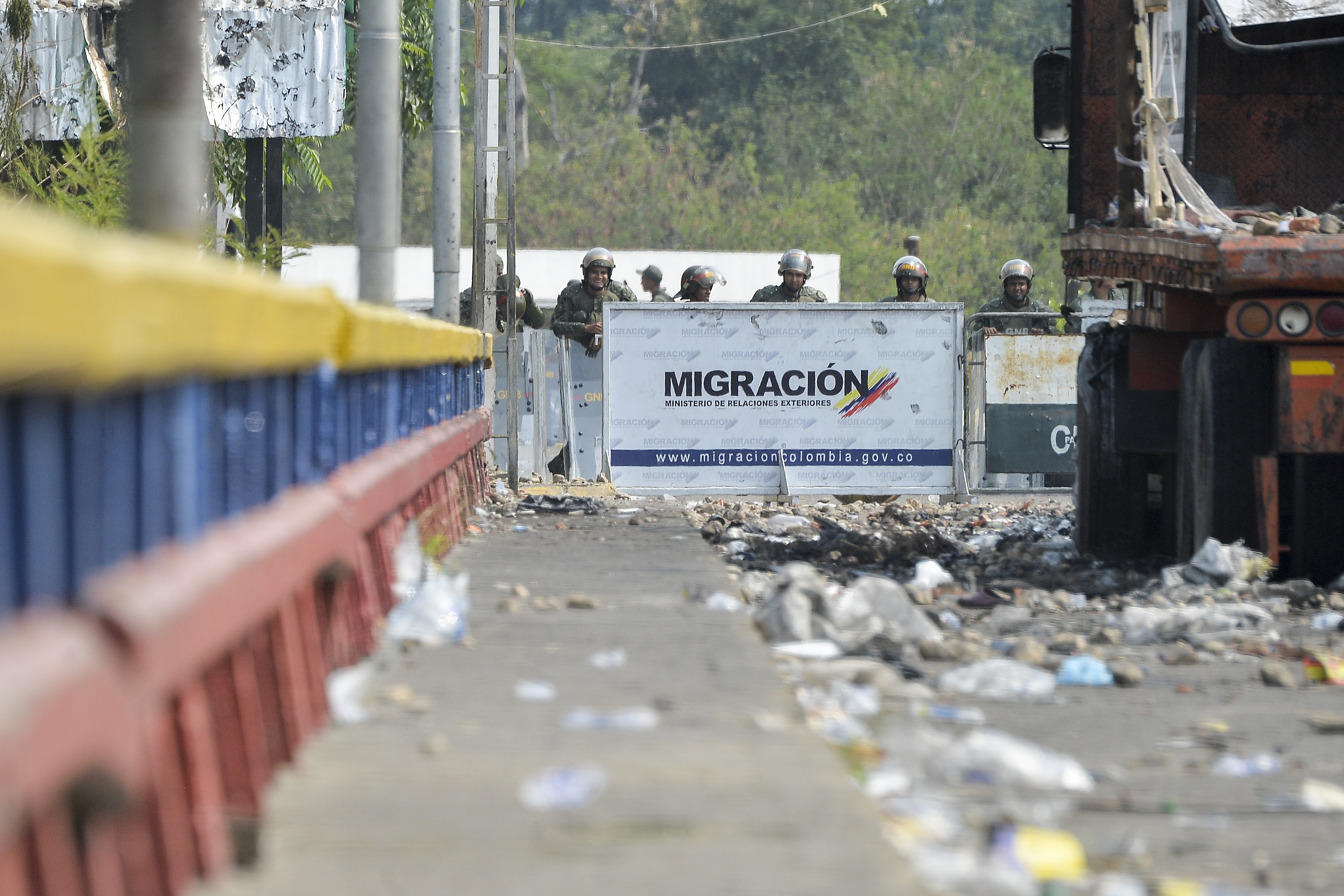 Bolivarian National Guard of Venezuela stand guard at the Francisco de Paula Santander international bridge in Urena, Venezuela on February 24. CREDIT: LUIS ROBAYO/AFP/Getty Images