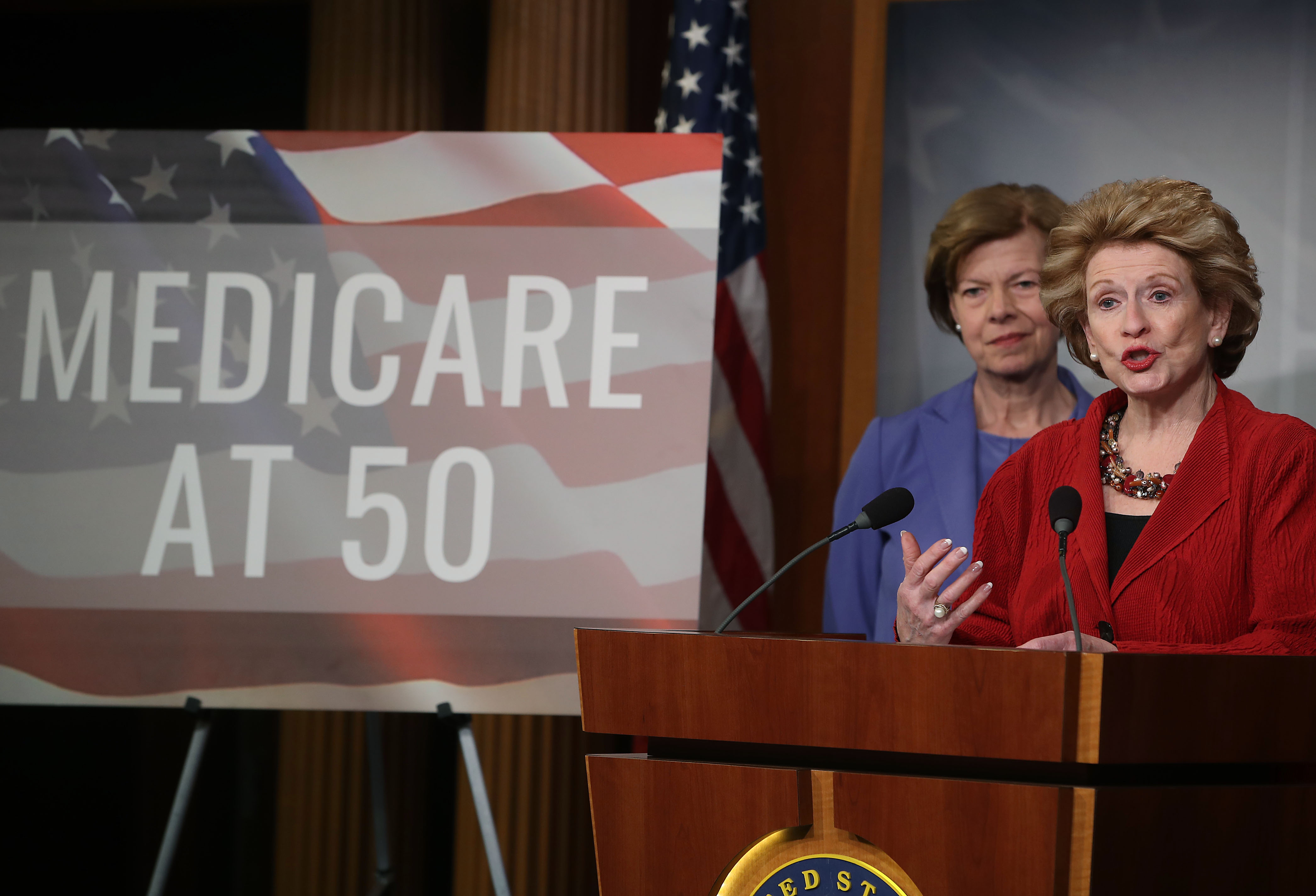 Sen. Debbie Stabenow (D-MI) and Sen. Tammy Baldwin (D-WI) participate in a news conference to announce legislation giving people between the ages of 50 and 64 the option of buying into Medicare on February 13, 2019 in Washington, DC. (Photo Credit: Mark Wilson/Getty Images)