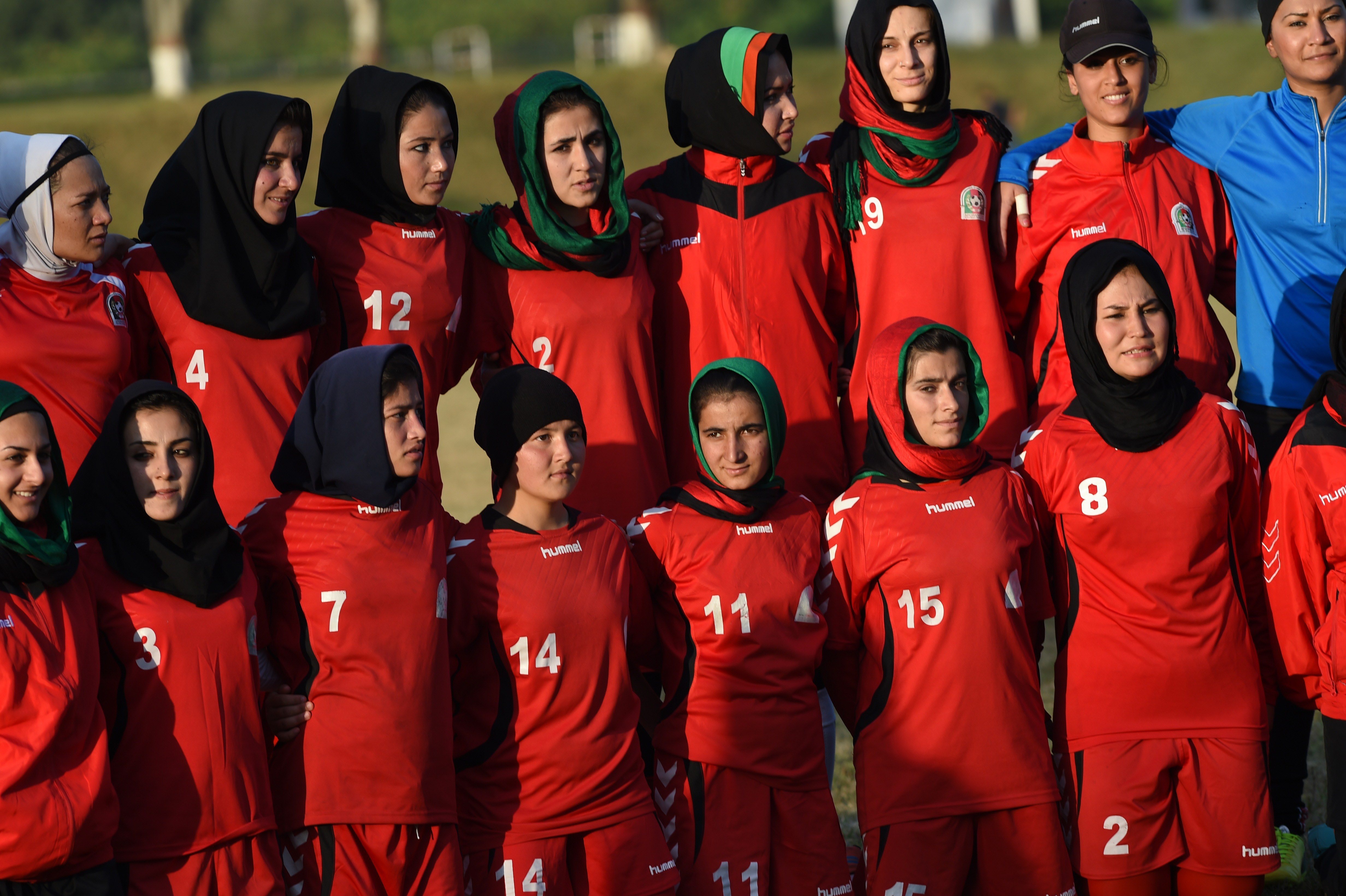 Afghan women football players pose during a practice ahead of the South Asia Football Federation (SAFF) women's football championship at the Sports Complex in Islamabad on November 10, 2014. Credit: FAROOQ NAEEM/AFP/Getty Images