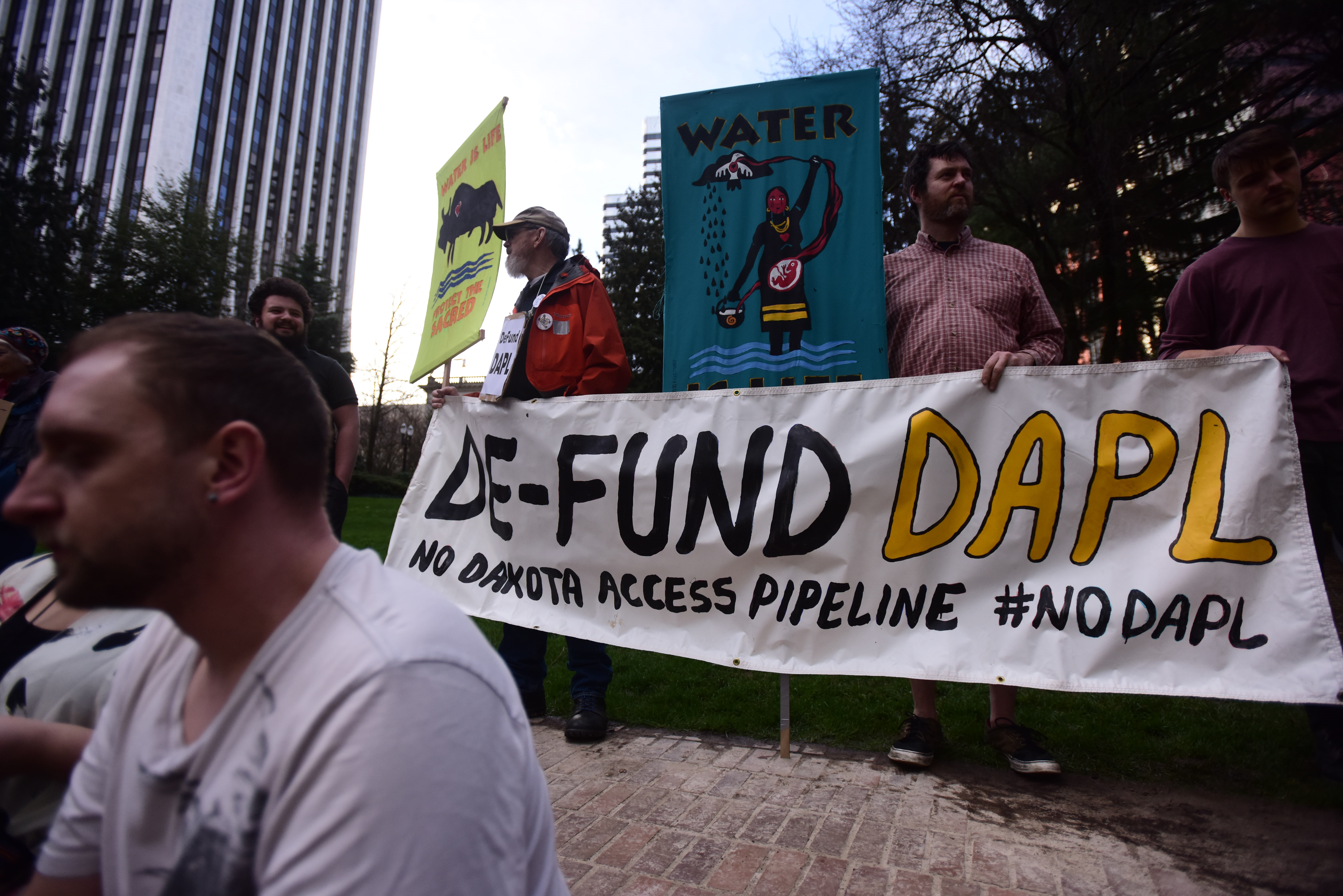 PORTLAND, UNITED STATES - MARCH 10 : Protesters stand in solidarity with the "Native Nations Rise" march on Washington, D.C. against the construction of the Dakota Access Pipeline in Portland, Ore., on March 10, 2017. This week a federal judge signed an order refusing to halt construction of the controversial pipeline which will carry crude oil under Lake Oahe near the Standing Rock Sioux reservation reservoir. (Photo by Alex Milan Tracy/Anadolu Agency/Getty Images)