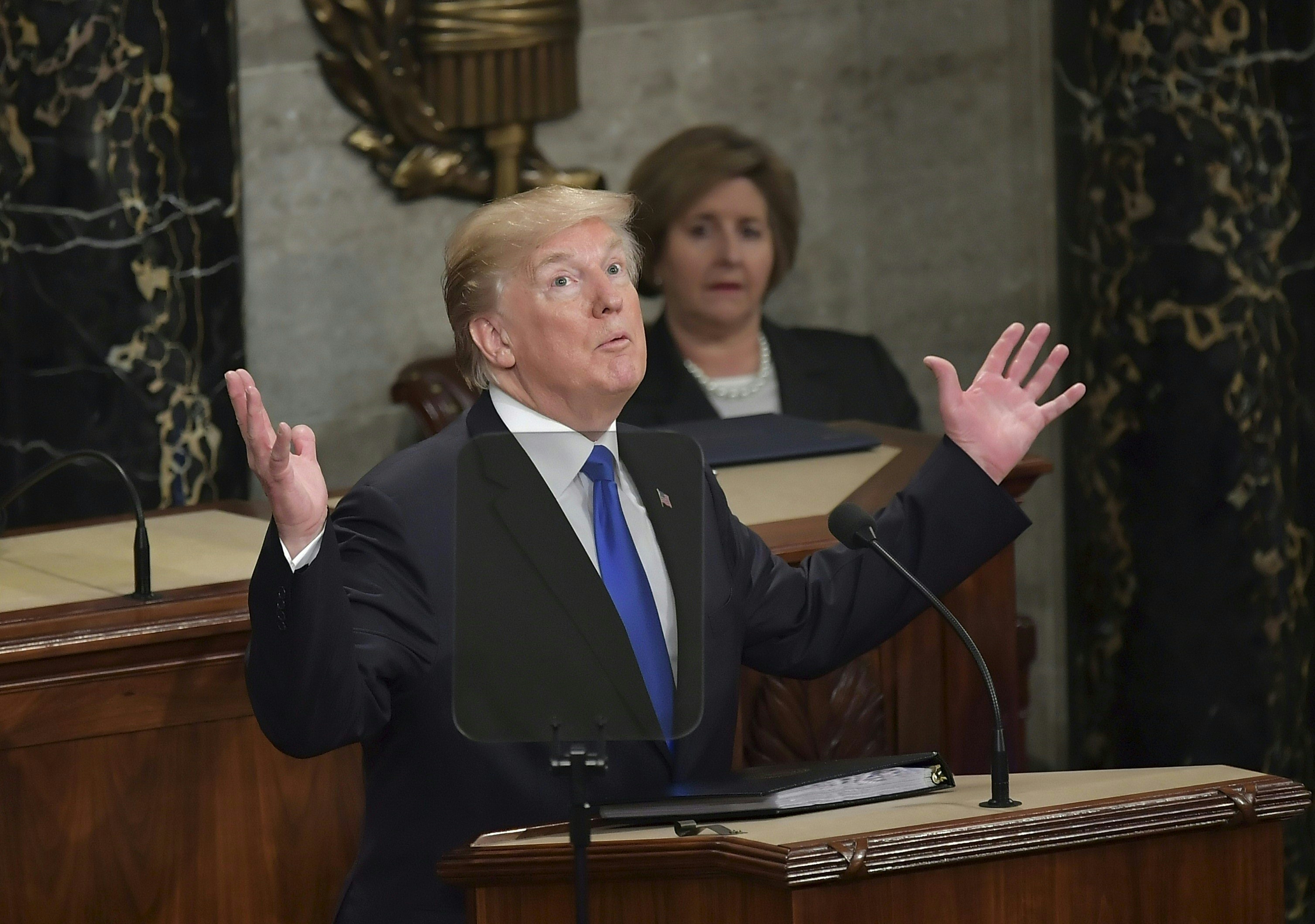 US President Donald Trump delivers the State of the Union address at the US Capitol in Washington, DC, on January 30, 2018. (Photo by Mandel NGAN / AFP)
