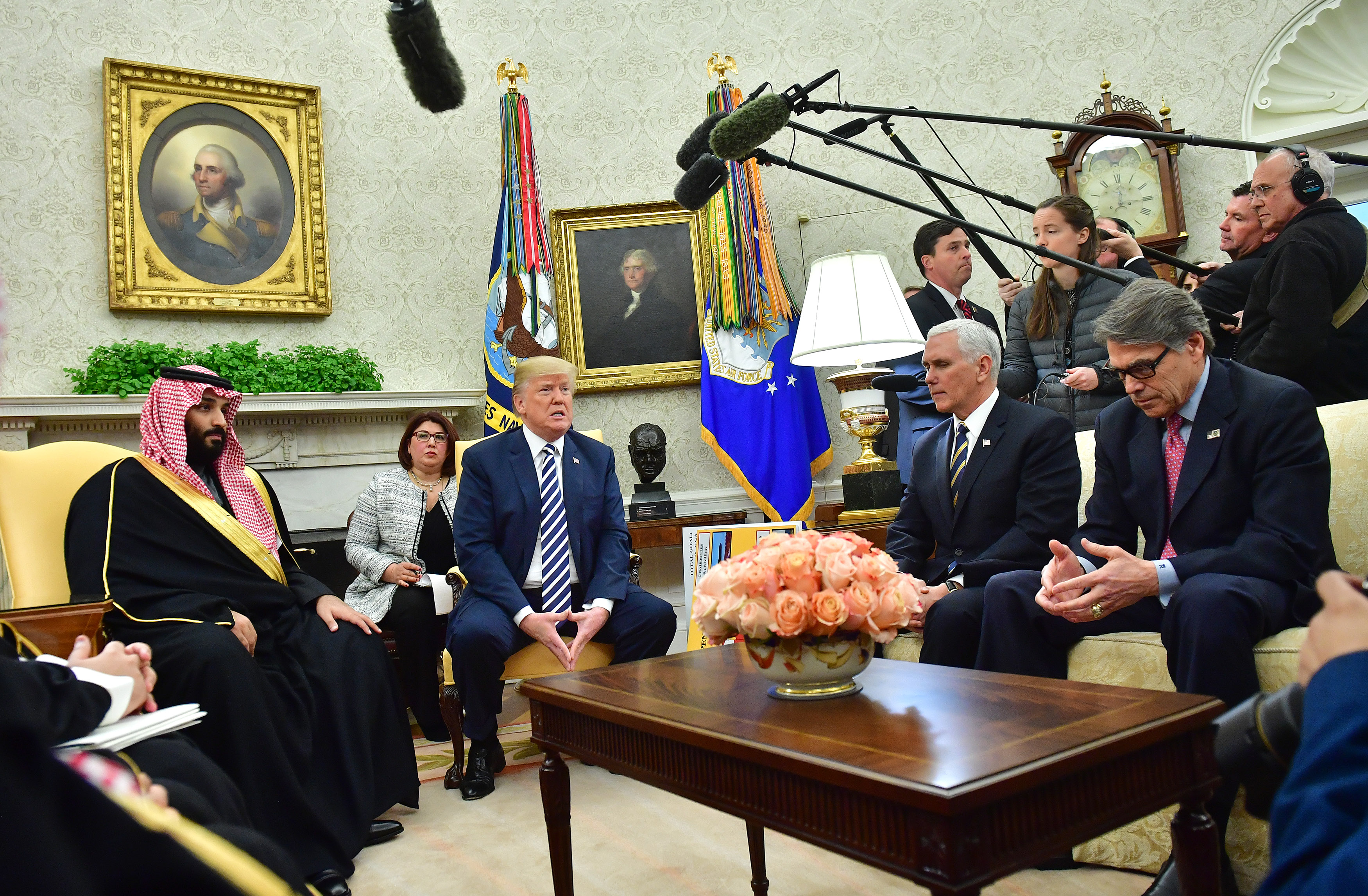 President Donald Trump meets Crown Prince Mohammed bin Salman of the Kingdom of Saudi Arabia in the Oval Office at the White House on March 20, 2018 in Washington, D.C. Also in the shot are Vice President Mike Pence and Energy Secretary Rick Perry. (PHOTO CREDIT: Kevin Dietsch-Pool/Getty Images)