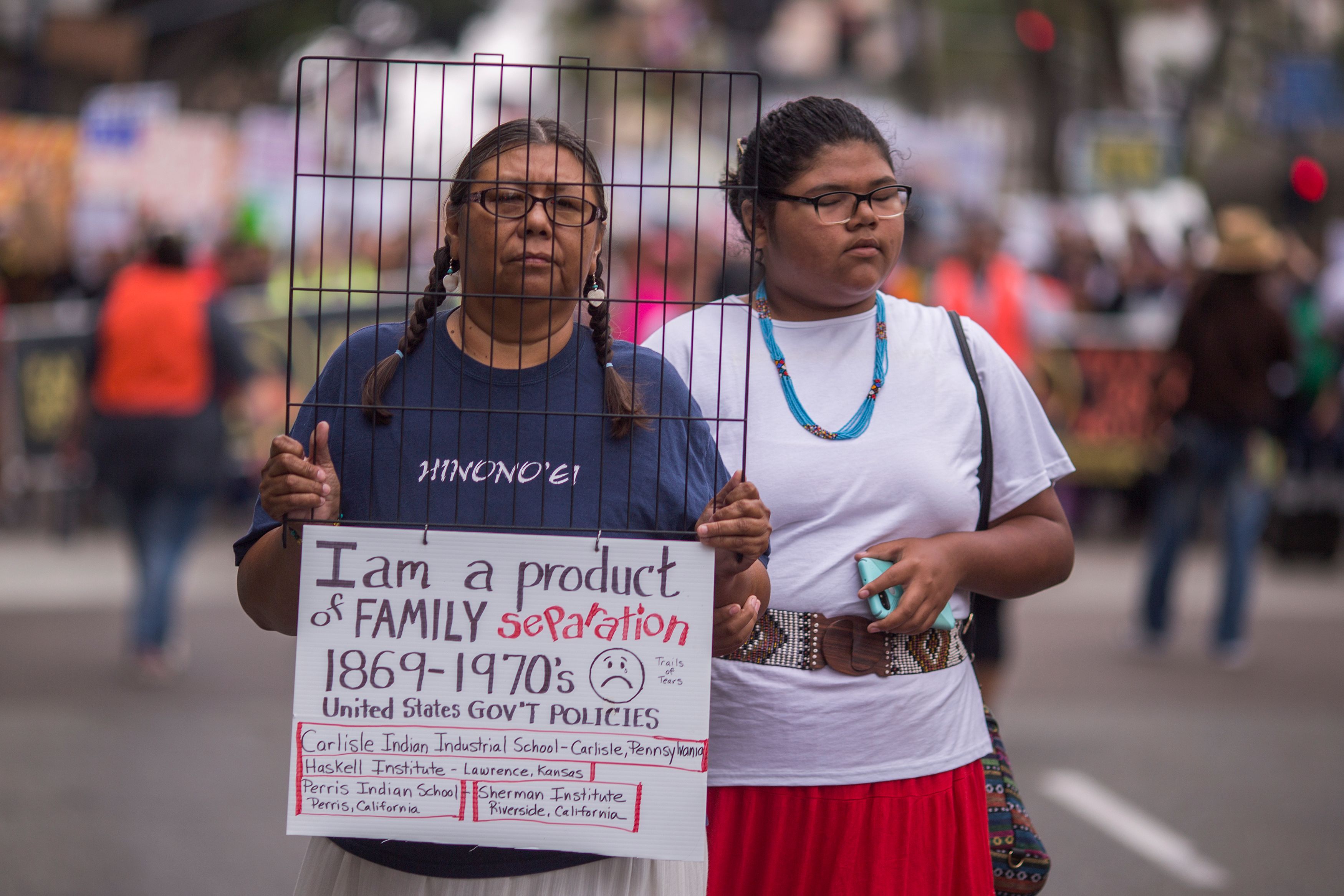 Native American women participate in a march to demand that thousands of children taken from their immigrant parents by border officials under recent controversial Trump administration policies be reunited on June 23, 2018 in San Diego, California. - US President Donald Trump ordered an end to the family separations which have sparked domestic and global outrage, but the fate of the more than 2,300 separated children remains unclear. (Photo by DAVID MCNEW / AFP) (Photo credit should read DAVID MCNEW/AFP/Getty Images)