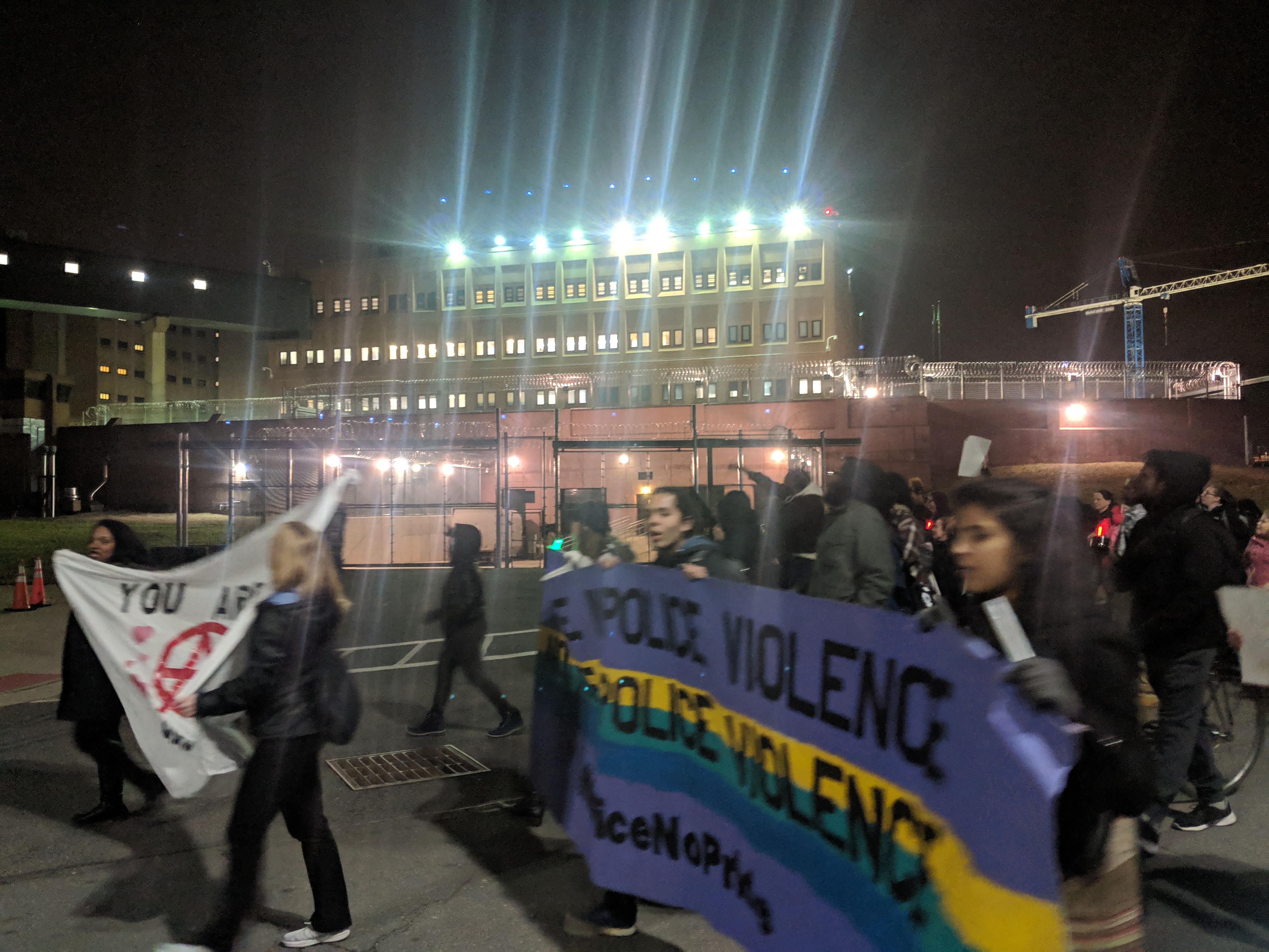 Washington, D.C. citizens marched around the city's lone jail and prison facility on Valentine's Day, playing music and chanting in solidarity with inmates who'd been kept indoors all day every day for eight months. CREDIT: Alan Pyke/ThinkProgress