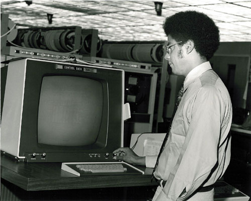 Washington at a computer terminal in his younger days. CREDIT: National Center for Atmospheric Research