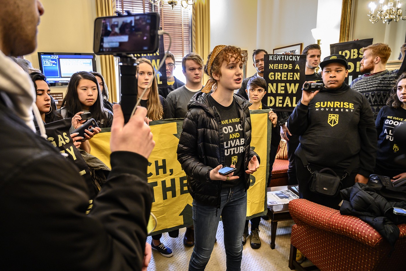 Young Kentuckians with the Sunrise Movement protest in Sen. Mitch McConnell’s office, February 25, 2019. CREDIT: Ken Schles.