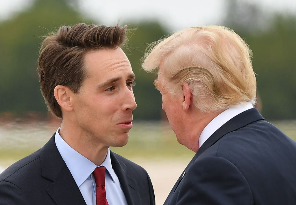 Sen. Josh Hawley (R-MO), looking at President Donald Trump at a September 2018 rally.