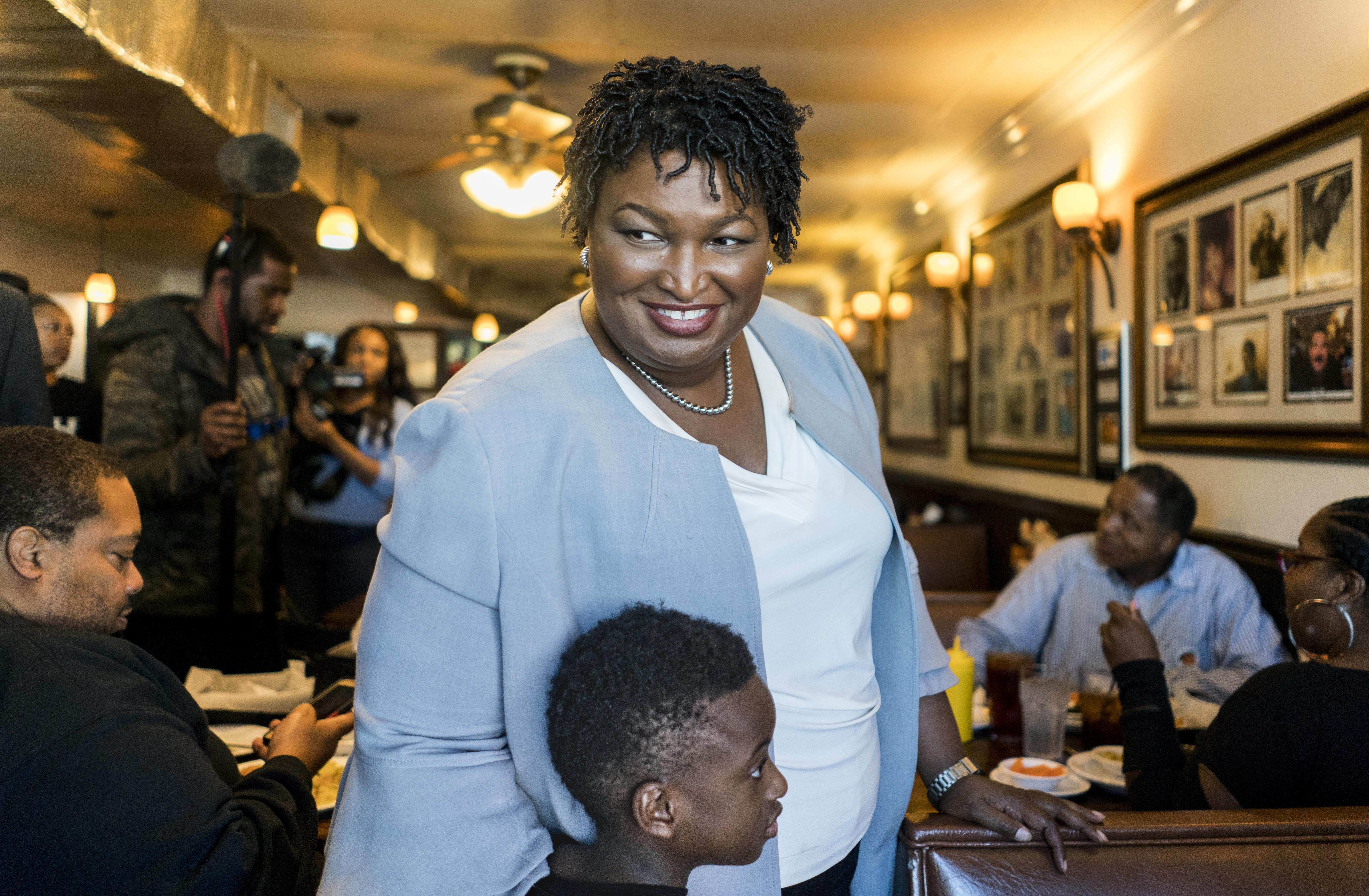 ATLANTA, GEORGIA - On election day former House Democratic Leader and Democratic nominee for Governor Stacey Abrams meets Georgia voters at The Busy Bee Cafe in Atlanta, Georgia on Tuesday November 6, 2018. (Photo credit: Melina Mara/The Washington Post via Getty Images)