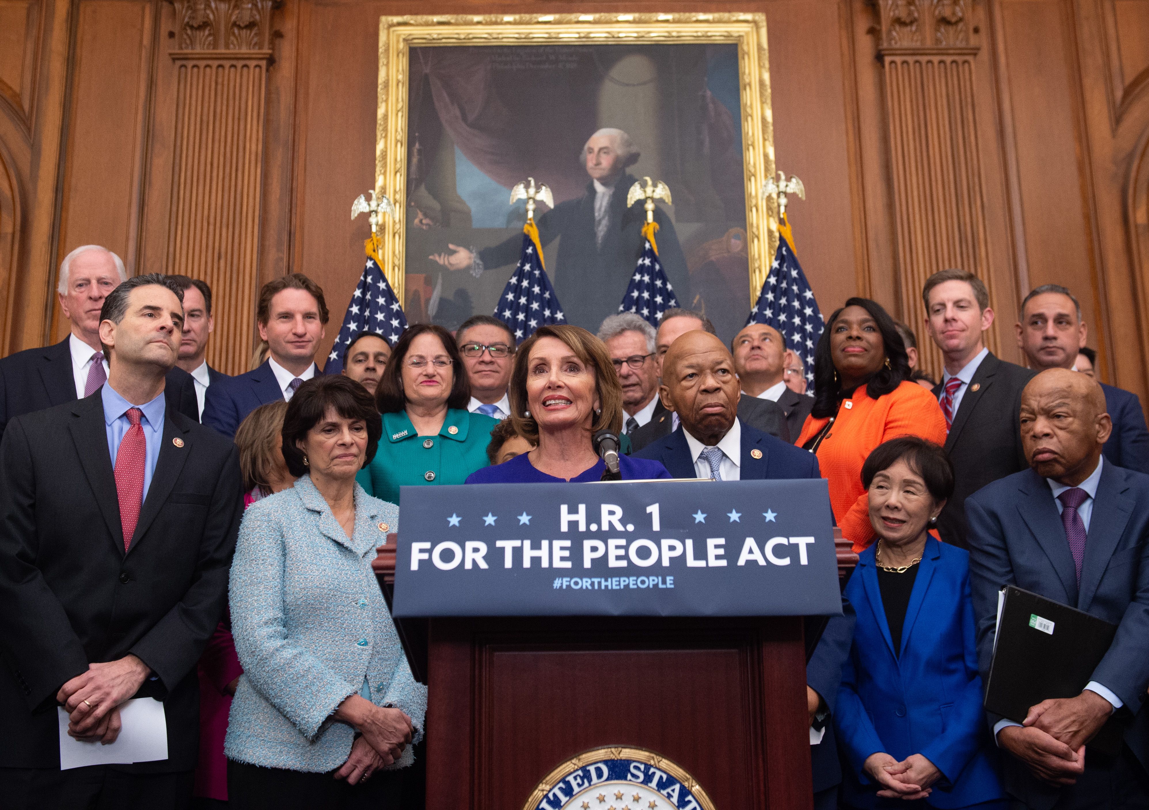The House passed H.R. 1, a sweeping electoral and voting rights reform bill, Wednesday. CREDIT: SAUL LOEB/AFP/Getty Images