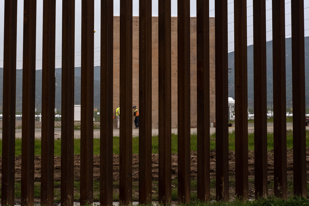 Senate Republicans join Democrats to block Trump’s national emergency declaration. Pictured: Workers labour on a border wall prototype at the US-Mexico border, as seen from Tijuana, Baja California state, Mexico, on February 26, 2019. (Photo credit: GUILLERMO ARIAS/AFP/Getty Images)