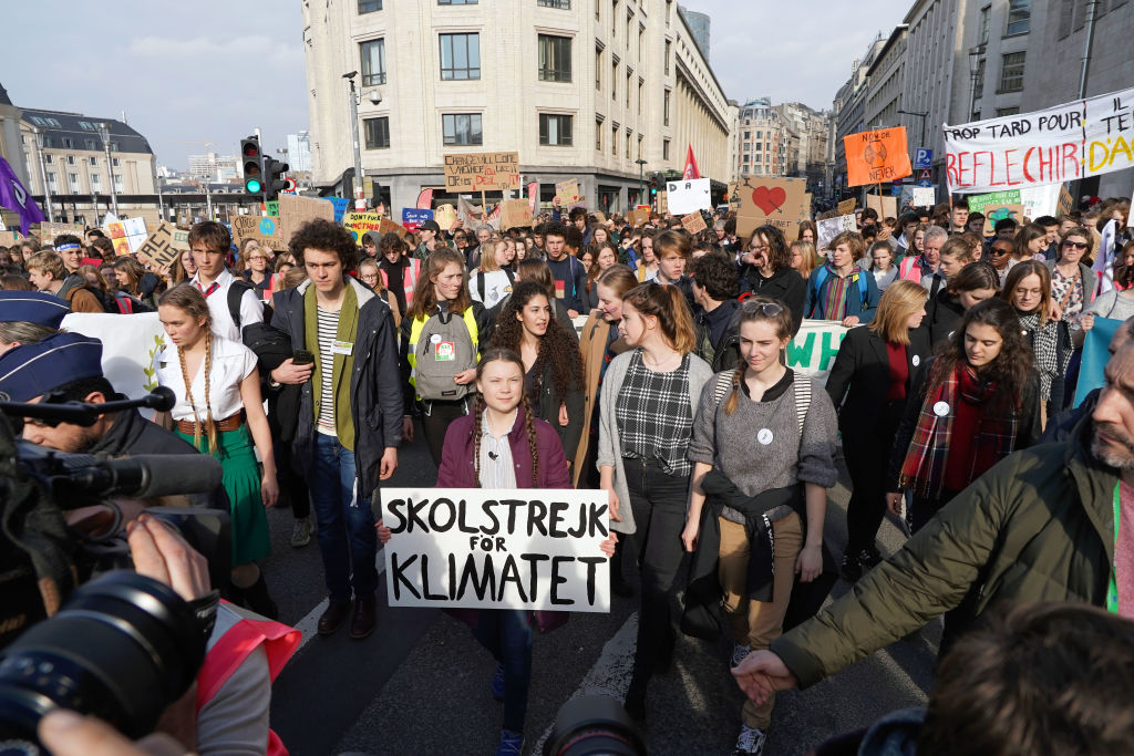 Leader of "Youth for Climate" Greta Thunberg attends Youth for climate march on February 21, 2019 in Brussels, Belgium. An average of 10,000 young people took to the streets to call for action on climate change. (Credit: Sylvain Lefevre/Getty Images)