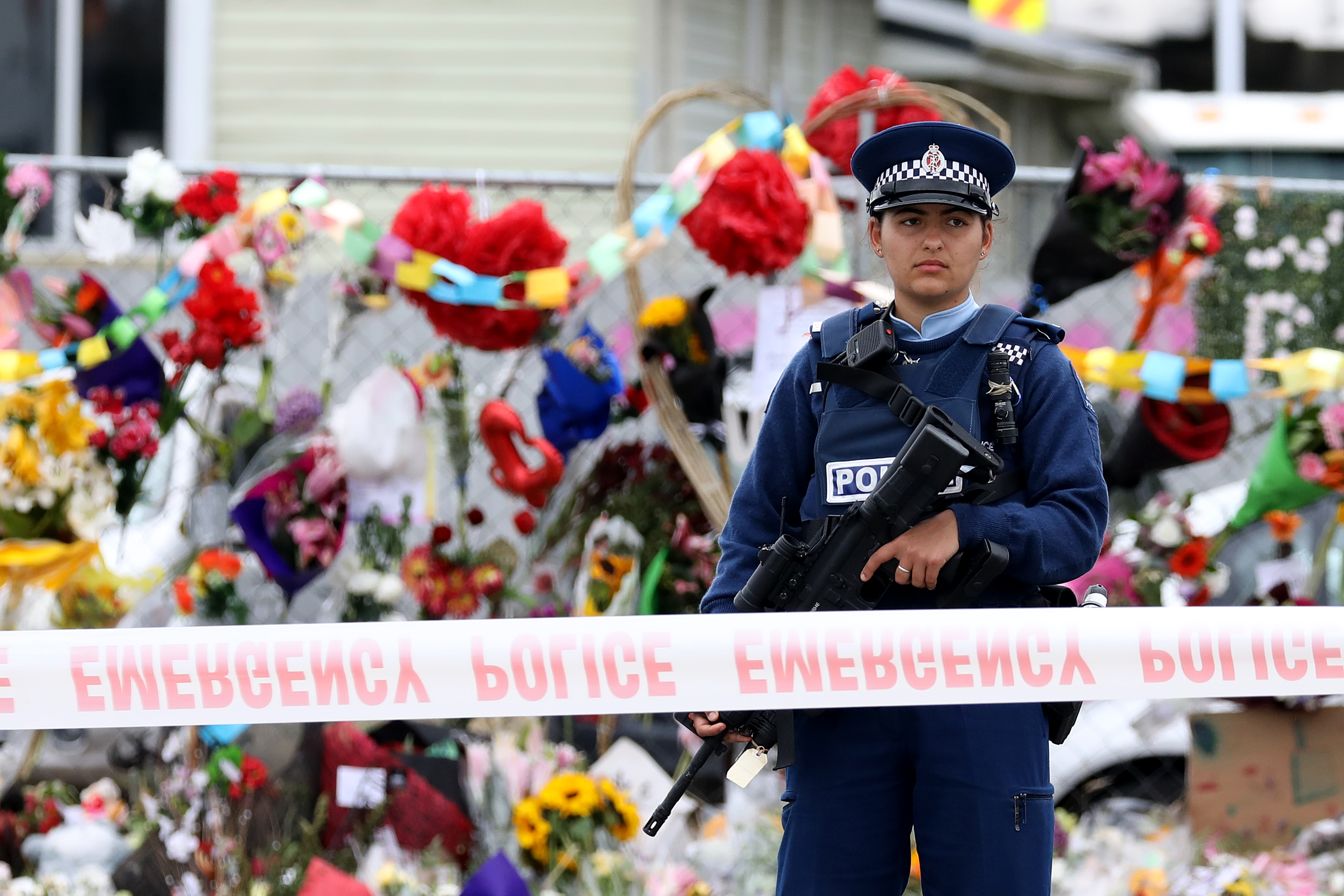 A policewoman stands guard outside the Linwood Mosque in Christchurch, New Zealand on March 21, 2019. New Zealand has banned the sale of assault rifles and semi-automatic weapons after the country's worst-ever attack that killed 50 people in two mosques last Friday, 15 March. (Photo Credit: Sanka Vidanagama/NurPhoto via Getty Images)