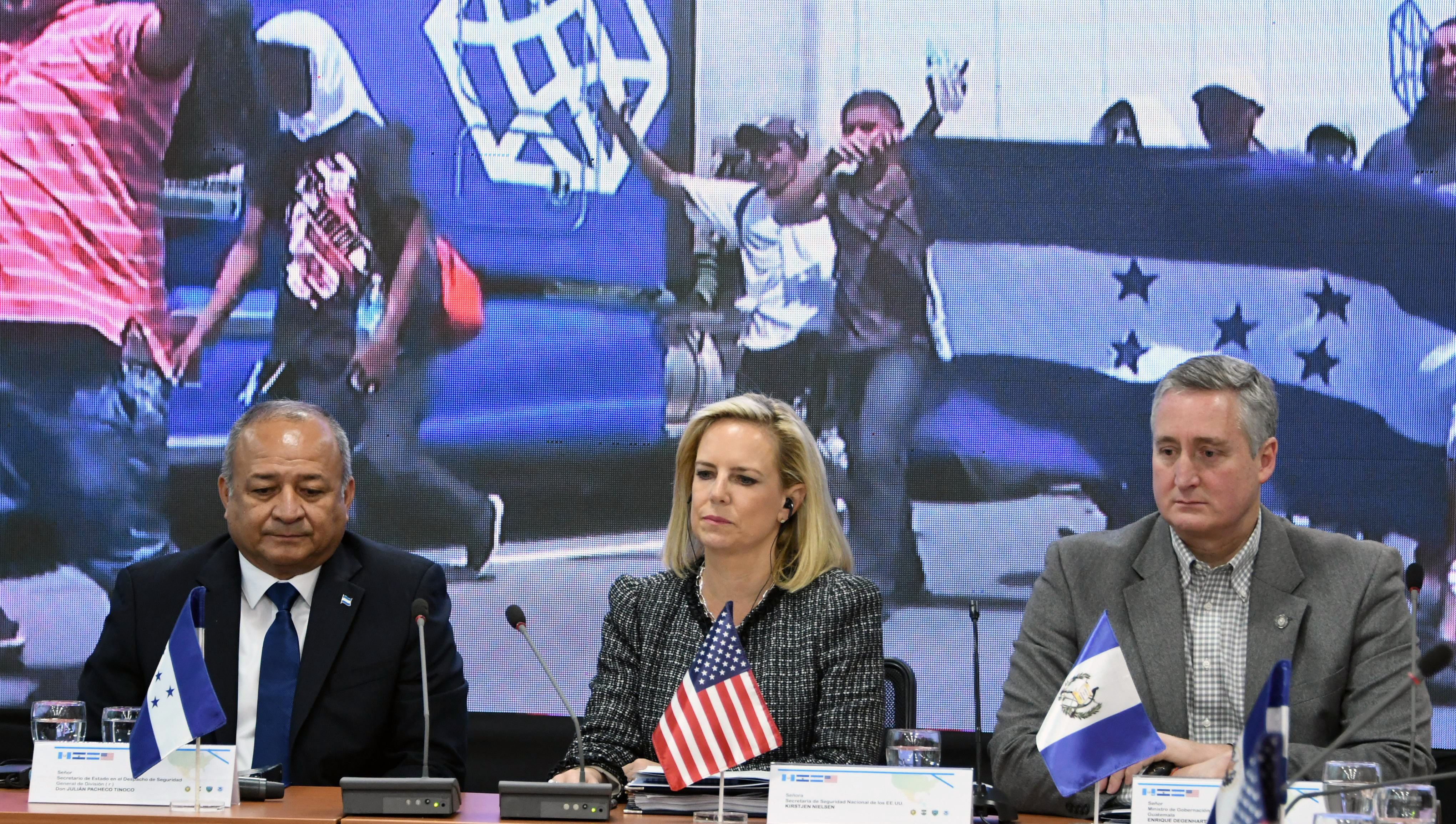 Homeland Security Secretary Kirstjen Nielsen, center, Honduran Security Minister Julian Pacheco, left, and Guatemalan Minister of Government Enrique Degenhart attend the Fifth Meeting of Ministers and Secretaries of Security of the Northern Trianle and the U.S. in Tegucigalpa, Honduras, on March 27, 2019. CREDIT: ORLANDO SIERRA/AFP/Getty Images