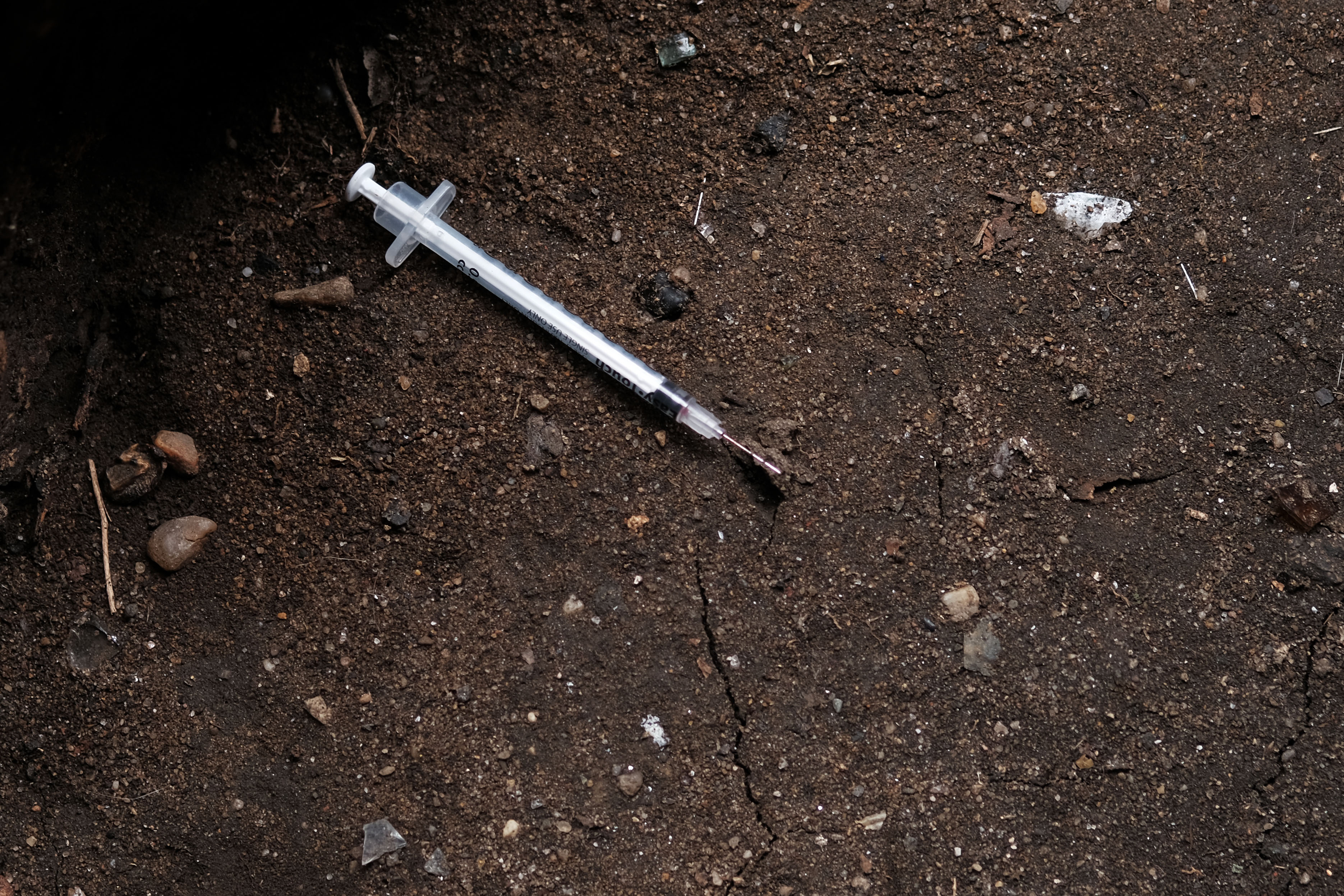 Hypodermic needles litter the ground in the South Bronx on March 13, 2019 in New York City. Drug makers such as Purdue Pharma are under increased legal scrutiny by states and attorney generals as hundreds of lawsuits tied to the deadly opioid epidemic move forward. (Photo by Spencer Platt/Getty Images)