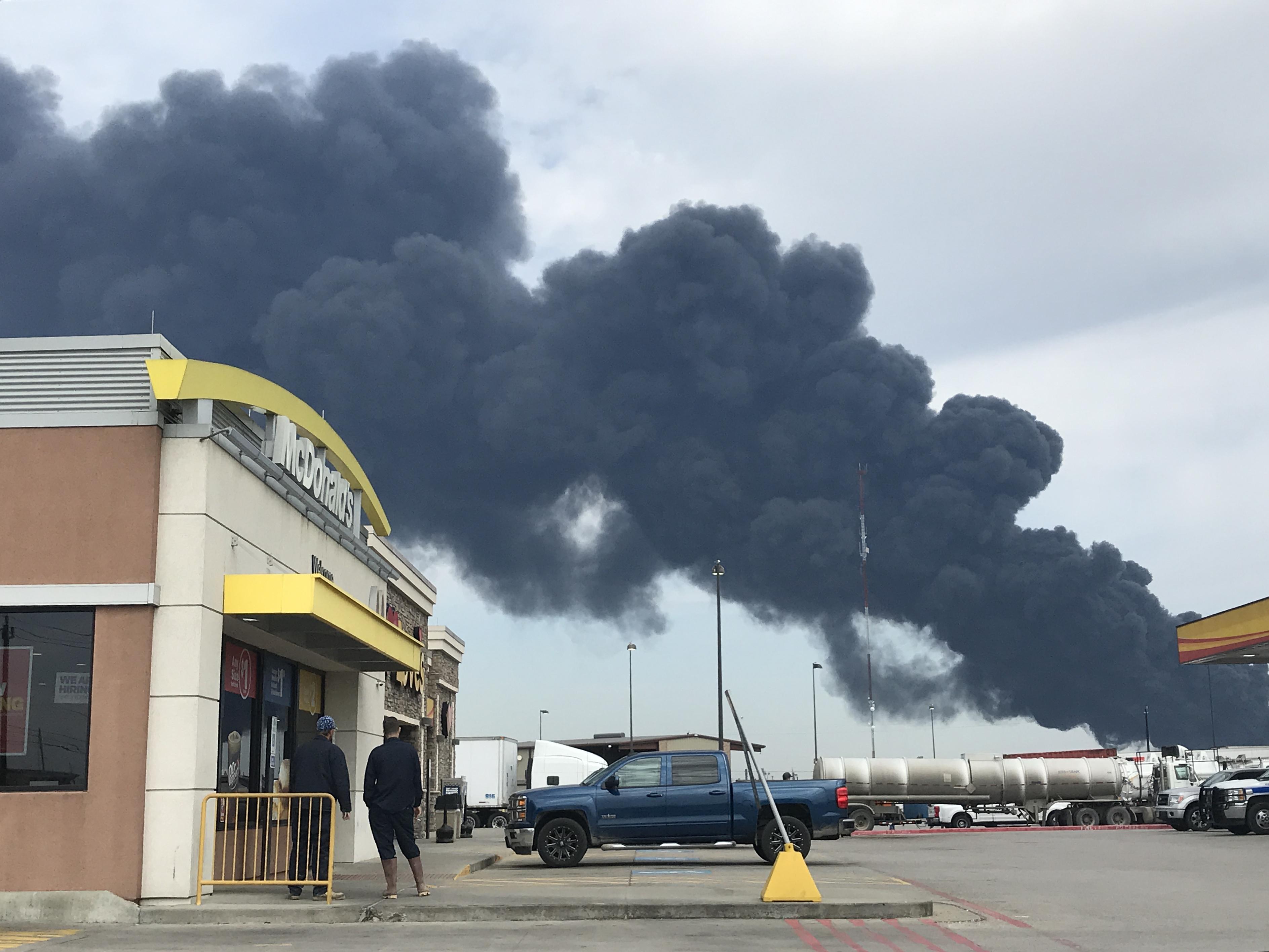 Smoke rises in the air following a fire at the Intercontinental Terminals Co (ITC) petrochemical storage site on March 19, 2019 in Houston, Texas. CREDIT: Zeng Jingning/China News Service/VCG via Getty Images