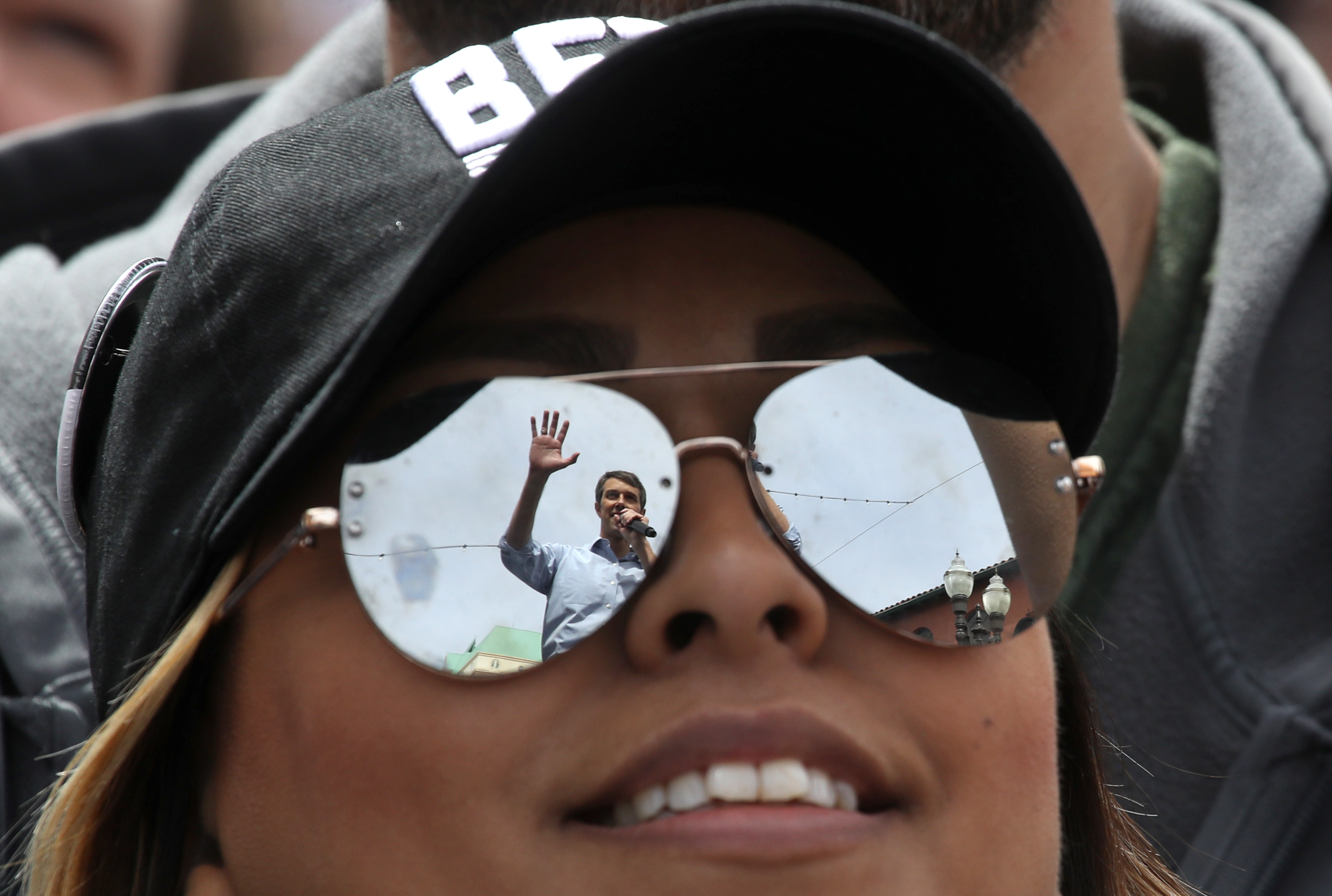 Democratic presidential hopeful former U.S. Rep. Beto O'Rourke (D-TX) is seen reflected in a supporters sunglasses as he speaks during a campaign rally on March 30, 2019 in El Paso, Texas. (CREDIT: Justin Sullivan/Getty Images)
