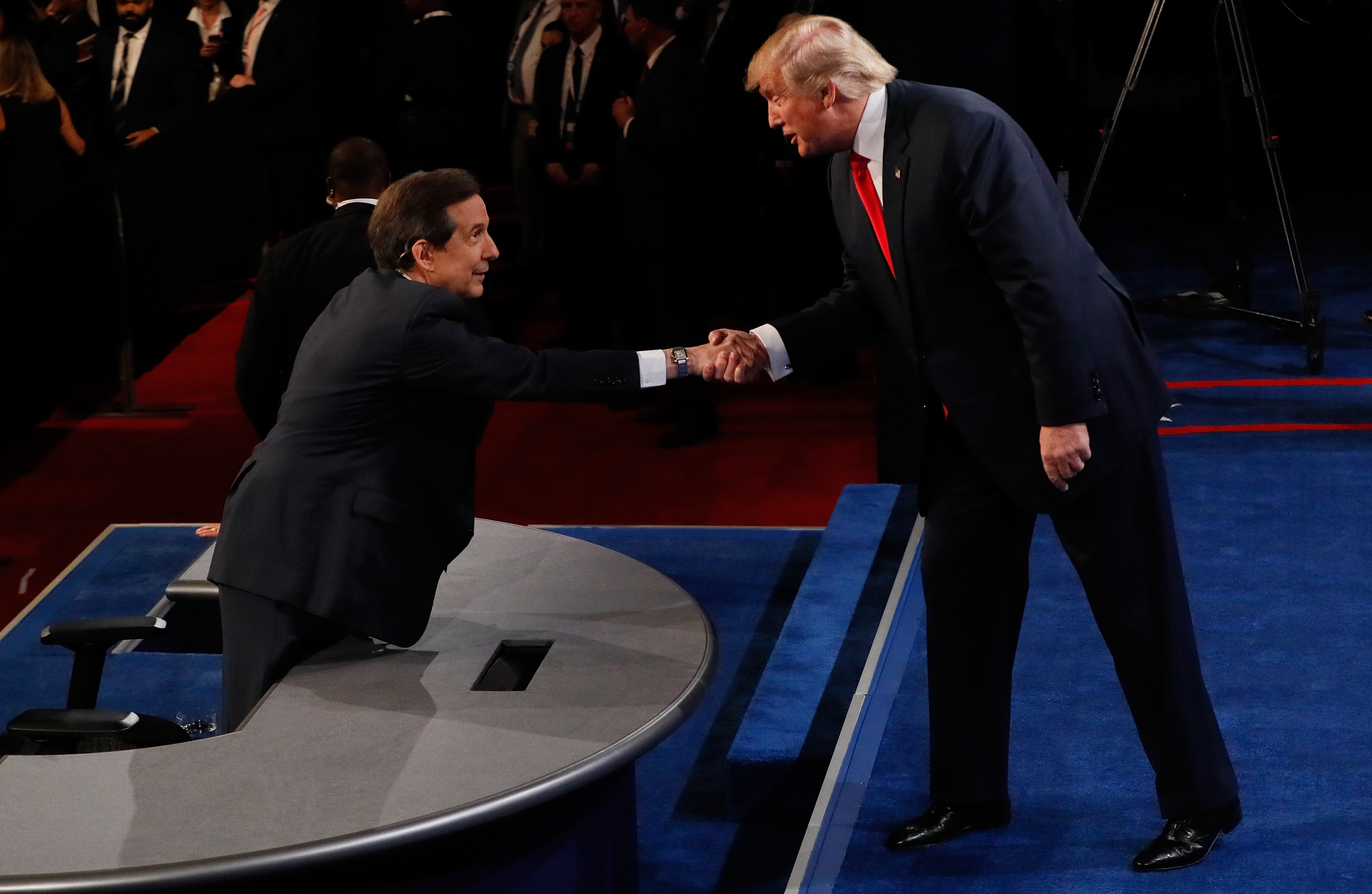 Republican presidential nominee Donald Trump shakes hands with Fox News anchor and moderator Chris Wallace after the third U.S. presidential debate at the Thomas & Mack Center on October 19, 2016 in Las Vegas, Nevada. (Photo by Mark Ralston-Pool/Getty Images)