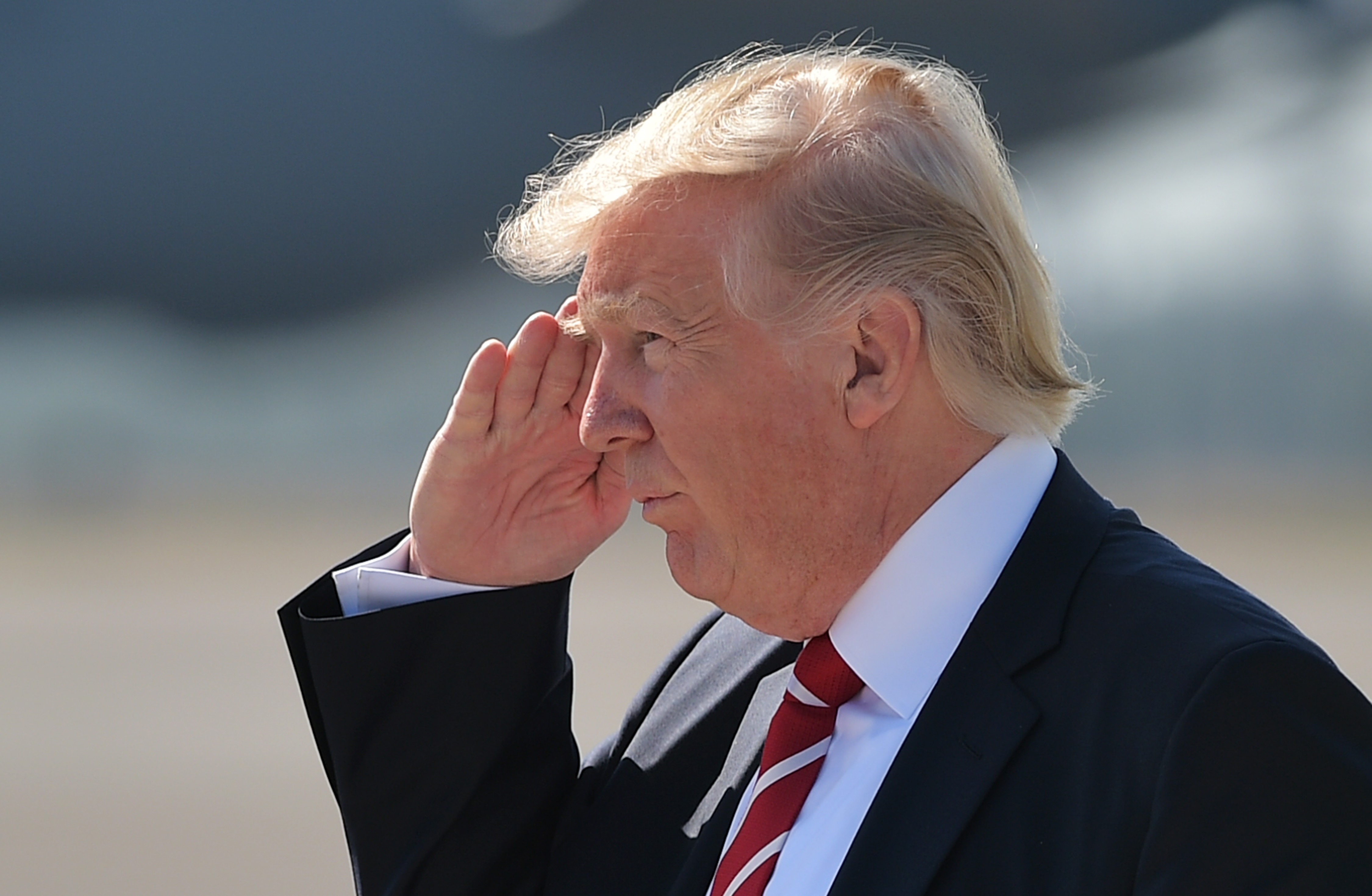 President Donald Trump salutes upon arrival at MacDill Air Force Base on February 6, 2017 in Tampa, Florida to visit the US Central Command and Specials Operations Command.
CREDIT: MANDEL NGAN/AFP/Getty Images