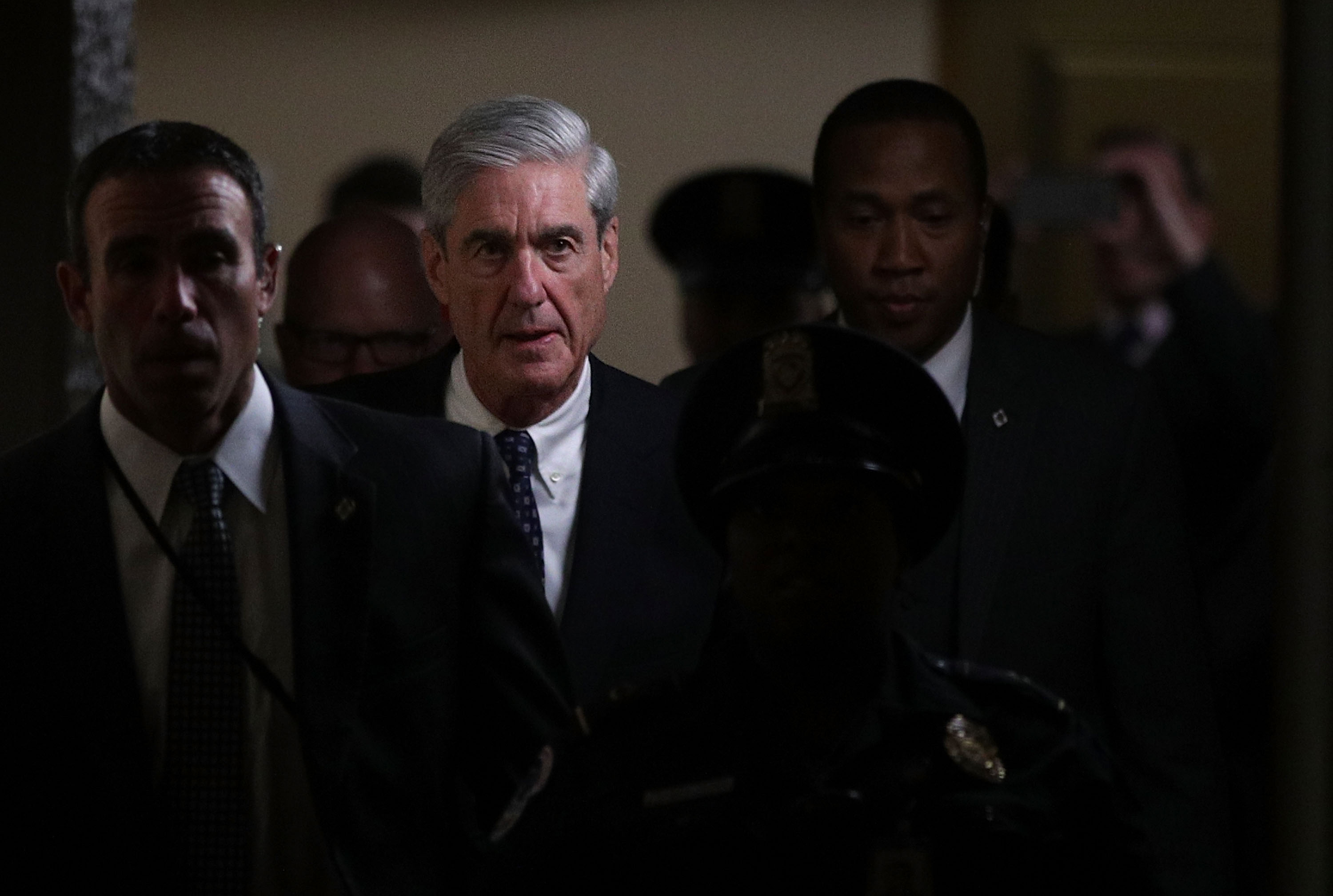 WASHINGTON, DC - JUNE 21: Special counsel Robert Mueller (2nd L) leaves after a closed meeting with members of the Senate Judiciary Committee June 21, 2017 at the Capitol in Washington, DC. The committee meets with Mueller to discuss the firing of former FBI Director James Comey. (Photo by Alex Wong/Getty Images)