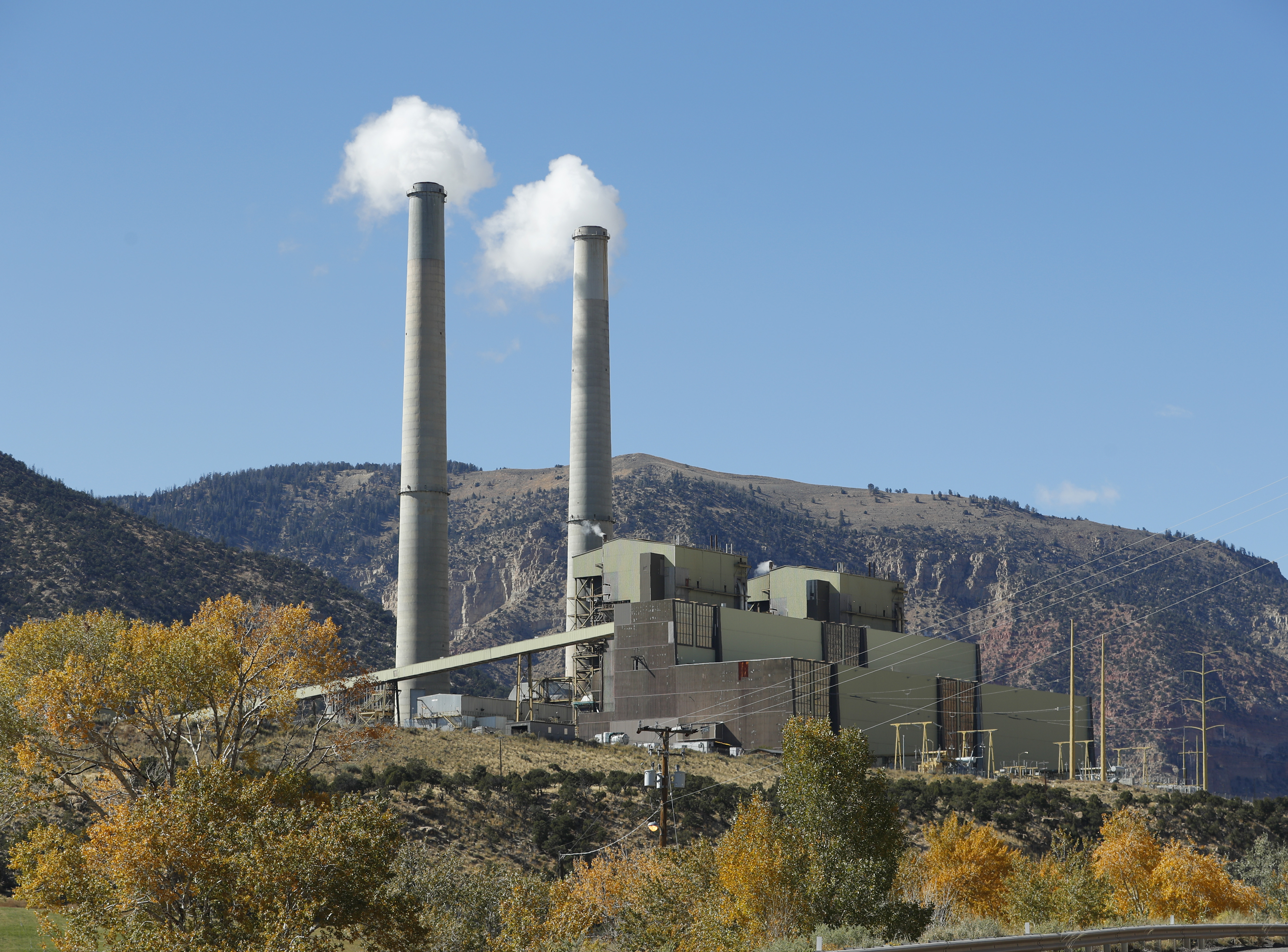 Emissions rise from smoke stacks at Pacificorp's 1000 megawatt coal fired power plant on October 9, 2017 outside Huntington, Utah. CREDIT: George Frey/Getty Images