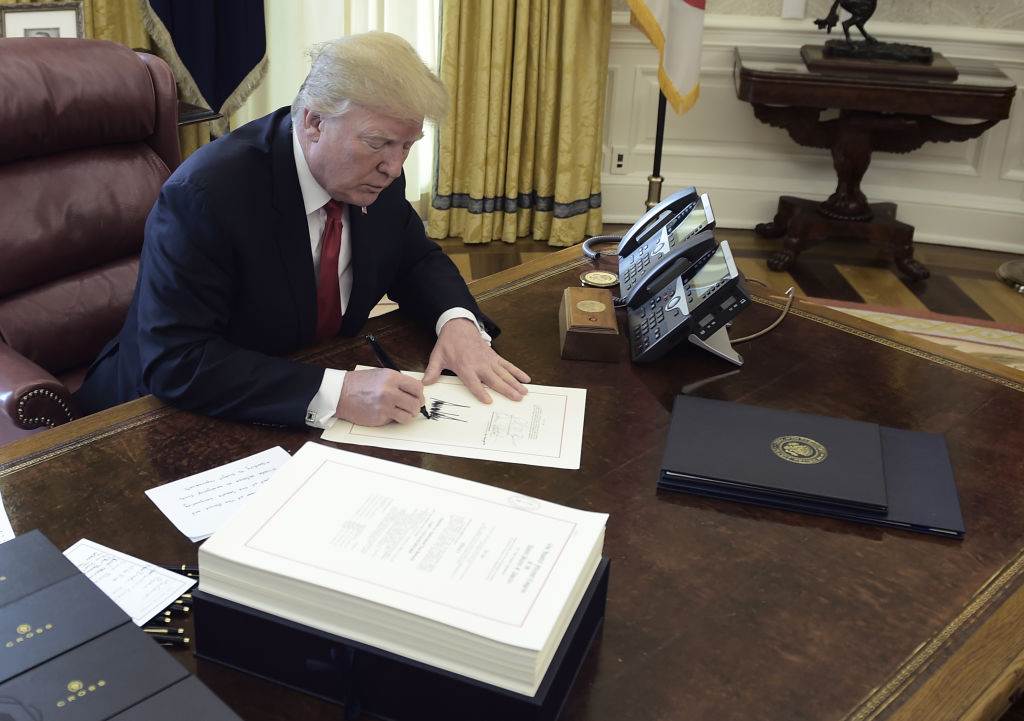 Donald Trump at the signing of his tax cut bill in December 2017.