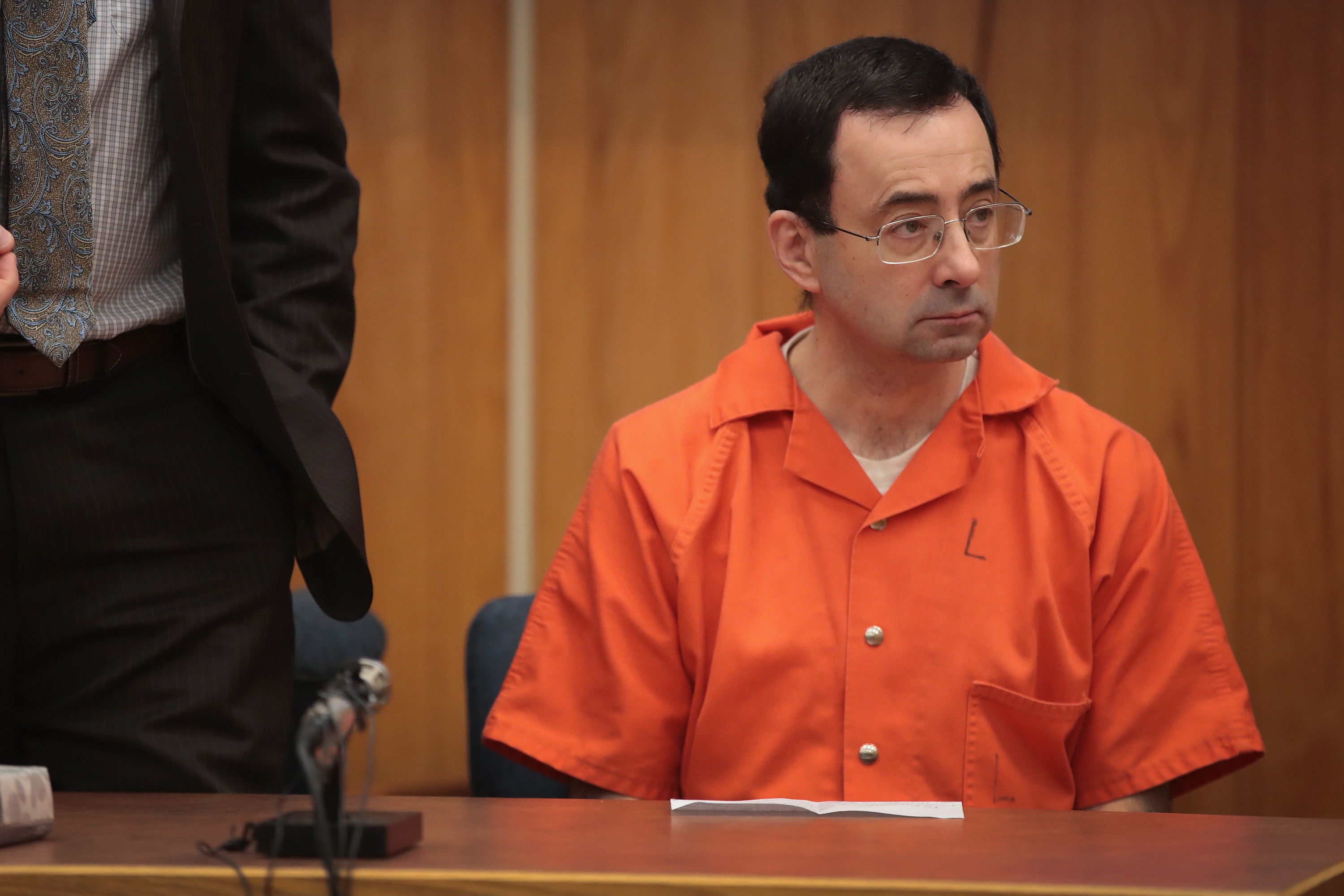 Larry Nassar sits in court listening to statements before being sentenced by Judge Janice Cunningham for three counts of criminal sexual assault in Eaton County Circuit Court on February 5, 2018 in Charlotte, Michigan. (Photo by Scott Olson/Getty Images)