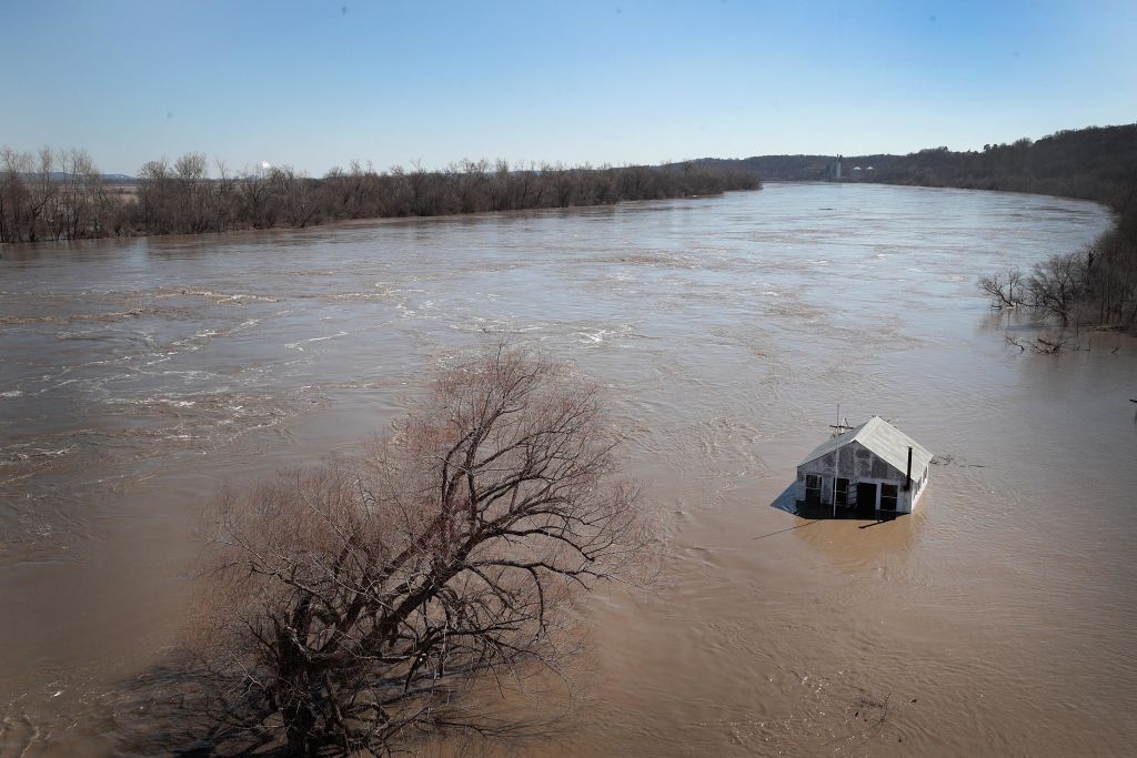A structure is surrounded by floodwater on March 21, 2019 in Atchison, Kansas. Several Midwest states are battling some of the worst flooding they have experienced in decades. (PHOTO Credit: Scott Olson/Getty Images)