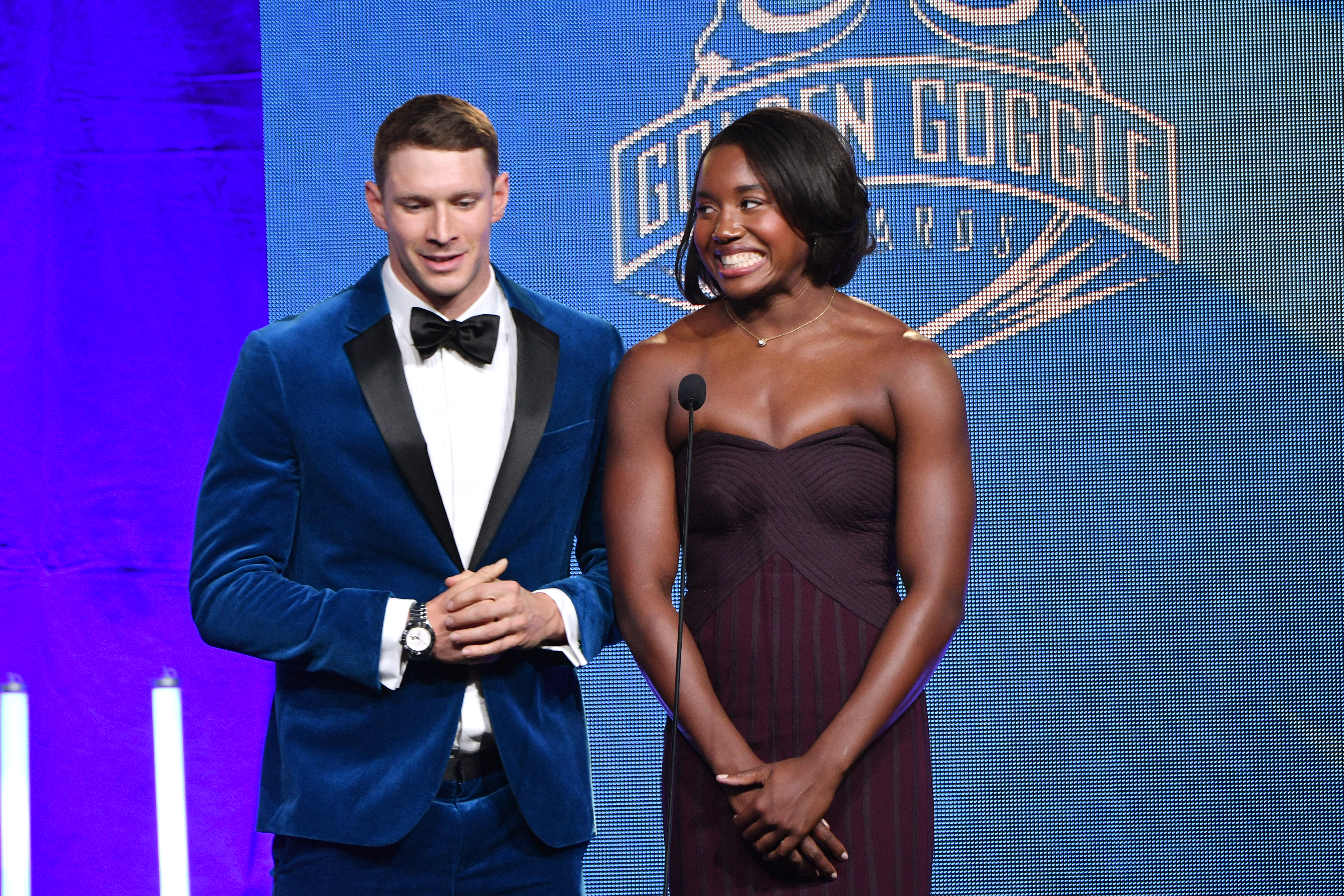 NEW YORK, NEW YORK - NOVEMBER 19: Competitive swimmer Ryan Murphy (L) and Simone Manuel speak during the 2018 Golden Goggle Awards on November 19, 2018 in New York City. (Photo by Mike Coppola/Getty Images)