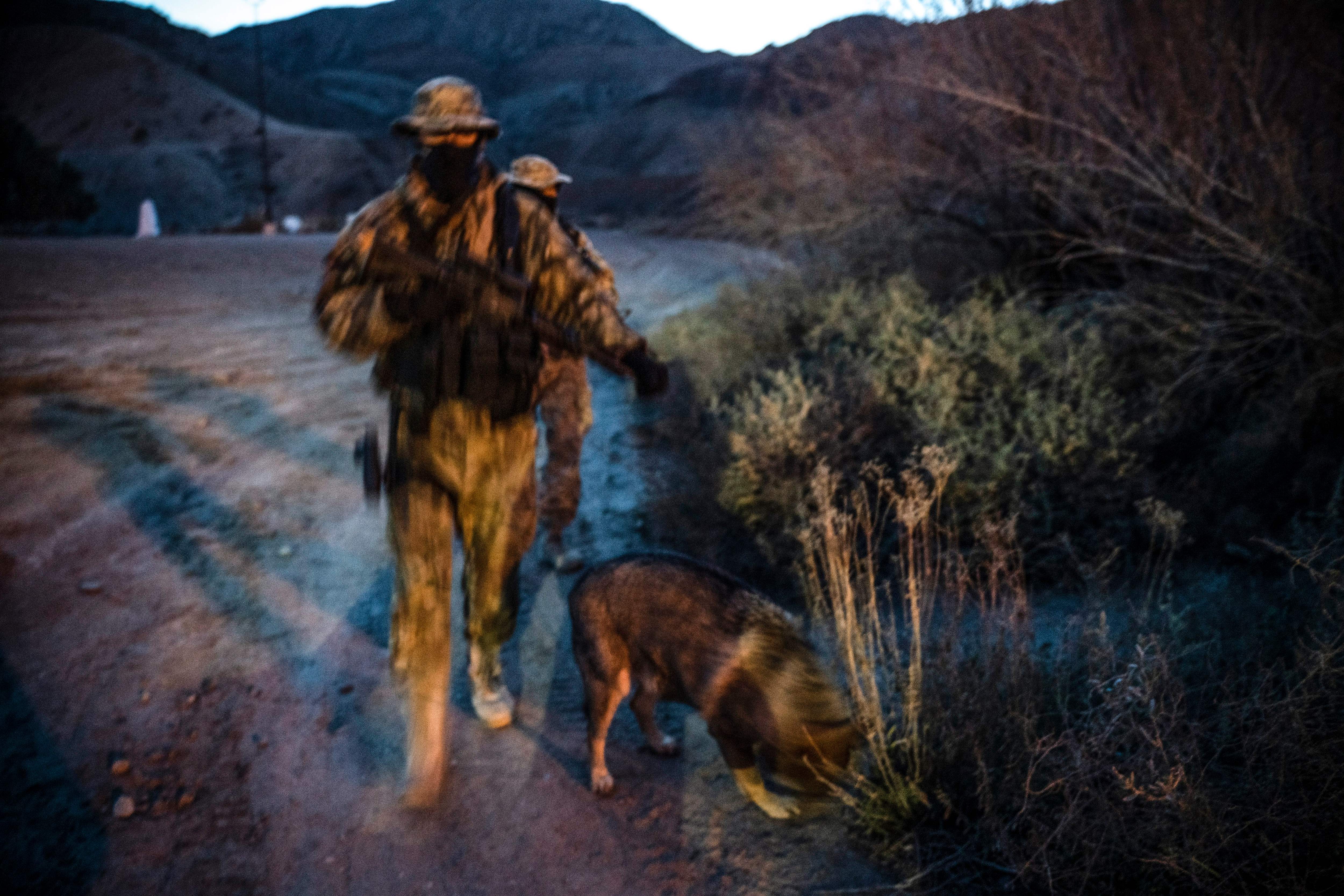 Members of the Constitutional Patriots New Mexico Border Ops Team militia patrol the US-Mexico border in Sunland Park, New Mexico on March 20, 2019. (Photo credit should read PAUL RATJE/AFP/Getty Images)