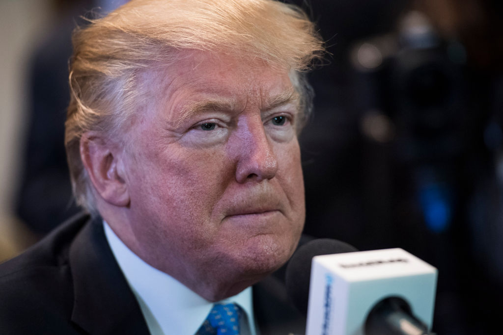 President Donald Trump gives an October 2017 radio interview.