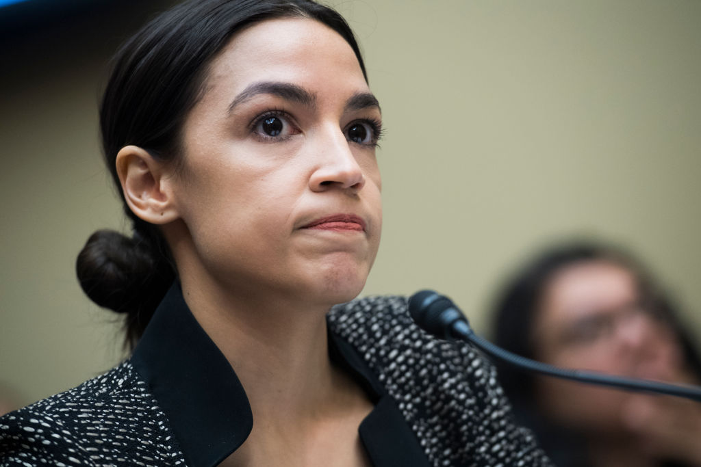 Rep. Alexandria Ocasio-Cortez (D-NY) during a House hearing in Rayburn Building titled "The Need for Leadership to Combat Climate Change and Protect National Security," on April 9, 2019. CREDIT: Tom Williams/CQ Roll Call via Getty Images.