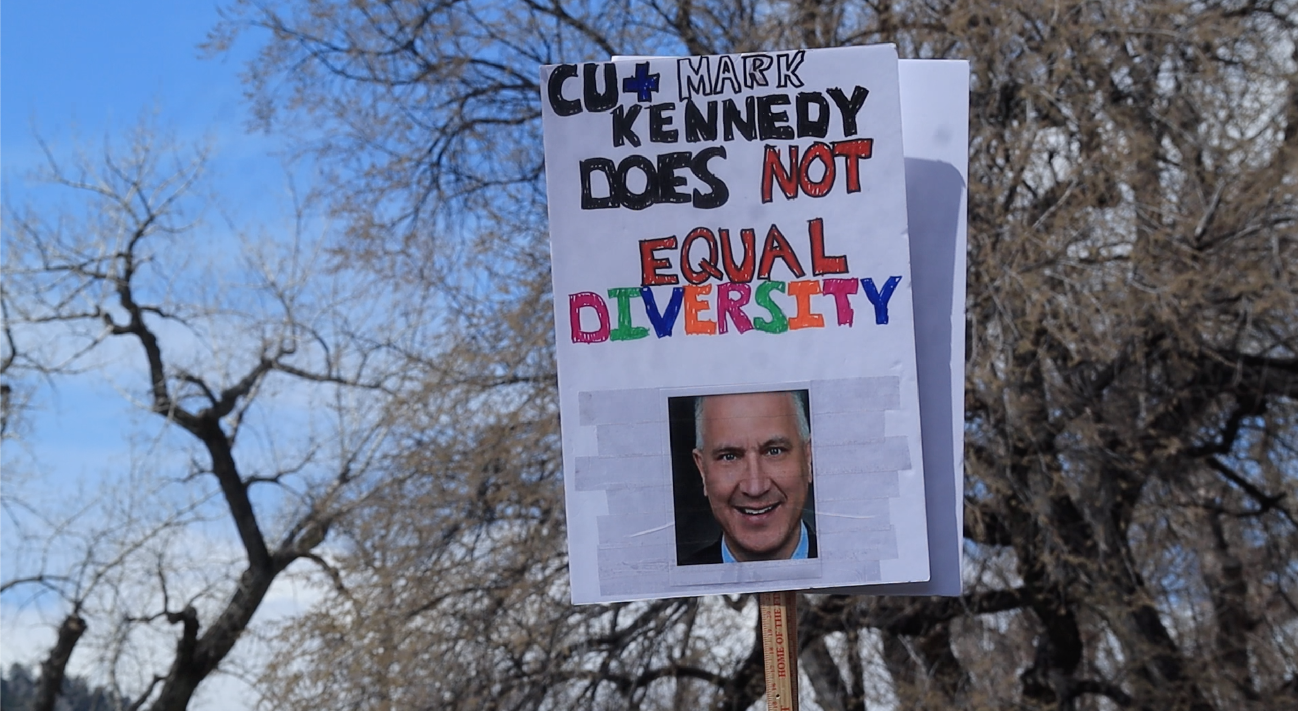 A sign at the protest against Mark Kennedy in Boulder, CO. (Credit: Robert Tann)