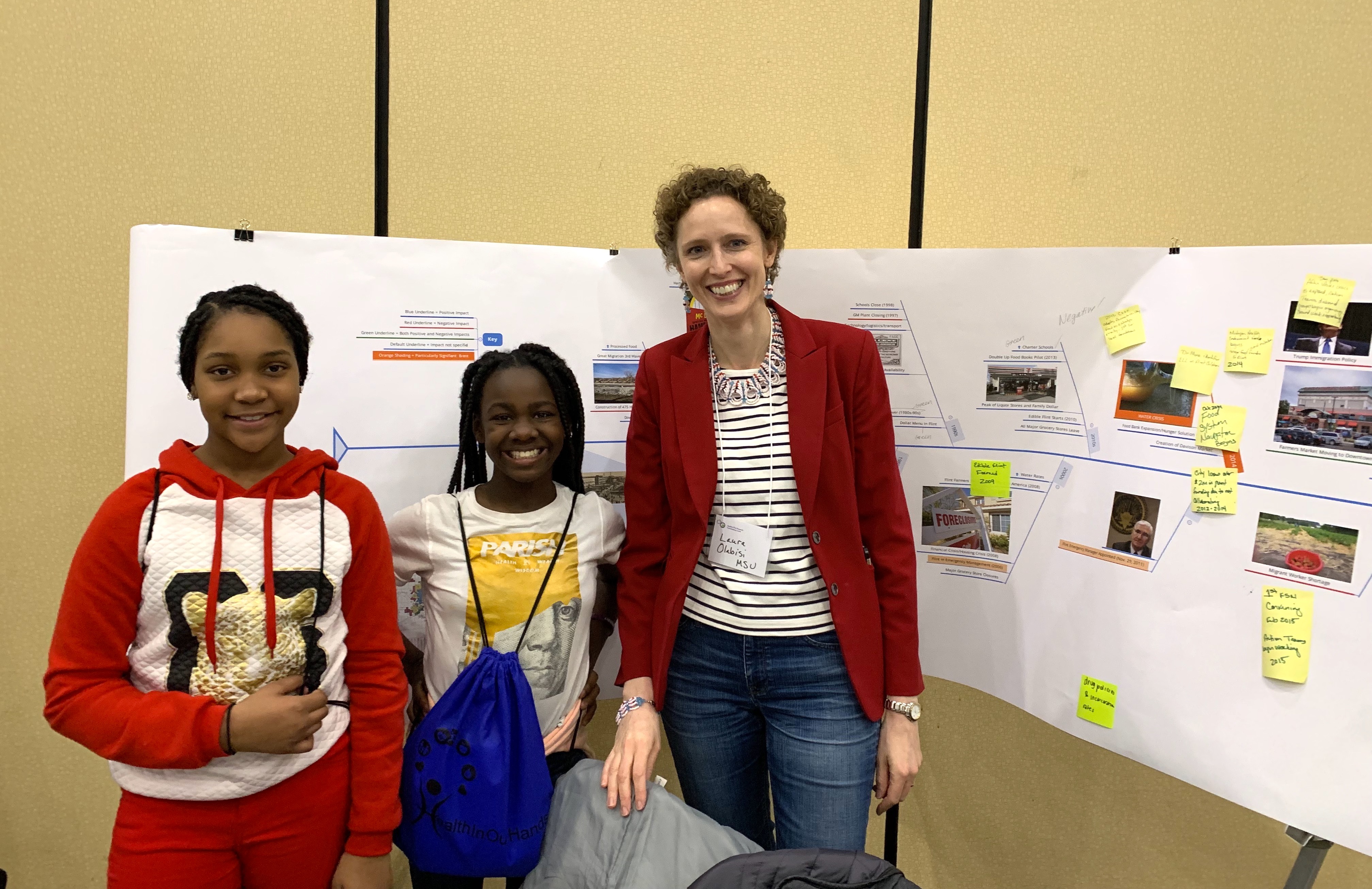 Professor Olabisi with young Flint residents. CREDIT: Chelsea Wentworth