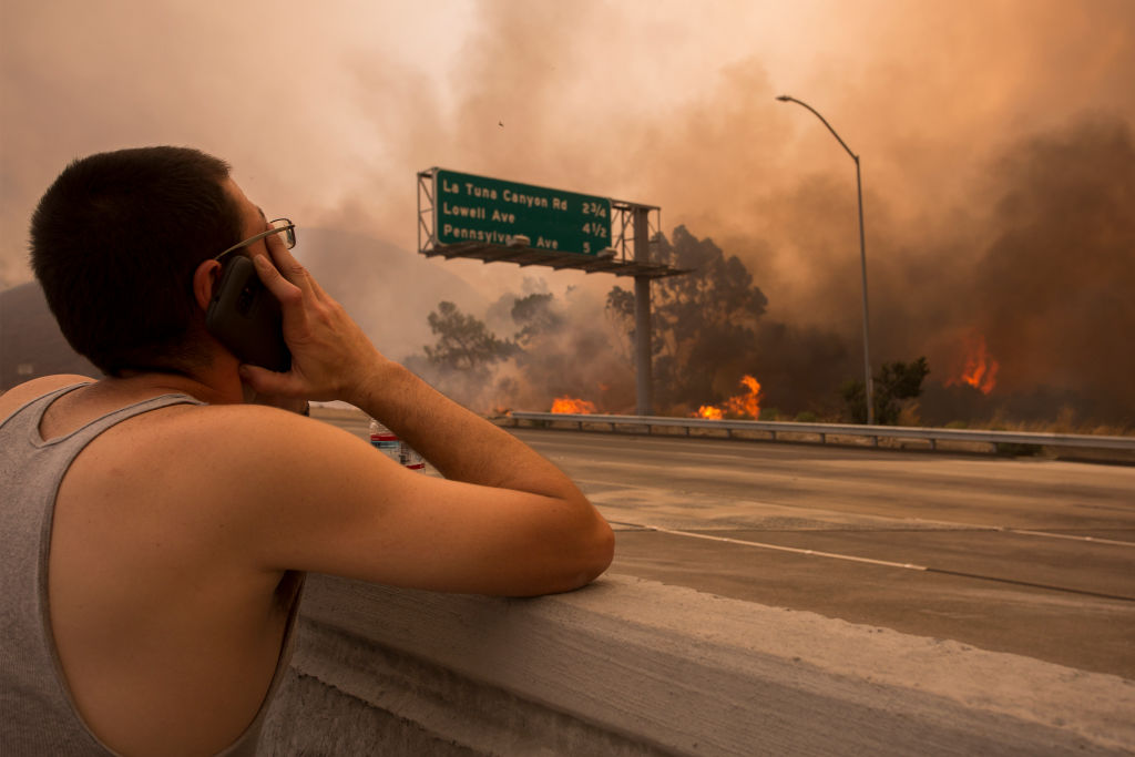 The past few years have seen increasingly more intense storms and wildfires in a sign of what scientists say can be expected from climate change. (Credit: David McNew/Getty Images)