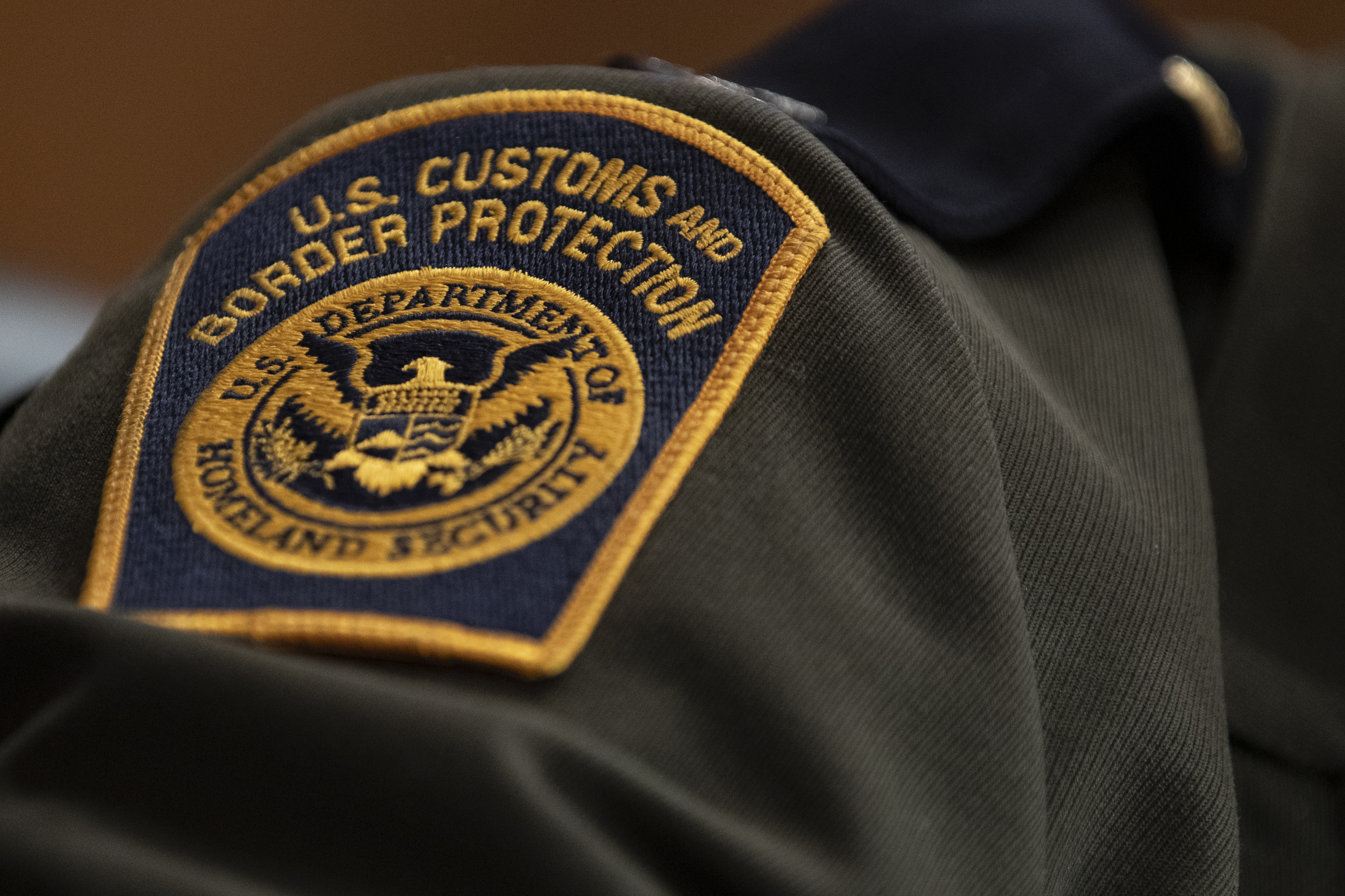 A U.S. Customs and Border Protection patch on the uniform of Rodolfo Karisch, Rio Grande Valley sector chief patrol agent for the U.S. Border Patrol, as he testifies during a U.S. Senate Homeland Security Committee hearing on migration on the Southern U.S Border on April 9, 2019 in Washington, DC. (Photo by Alex Edelman/Getty Images)