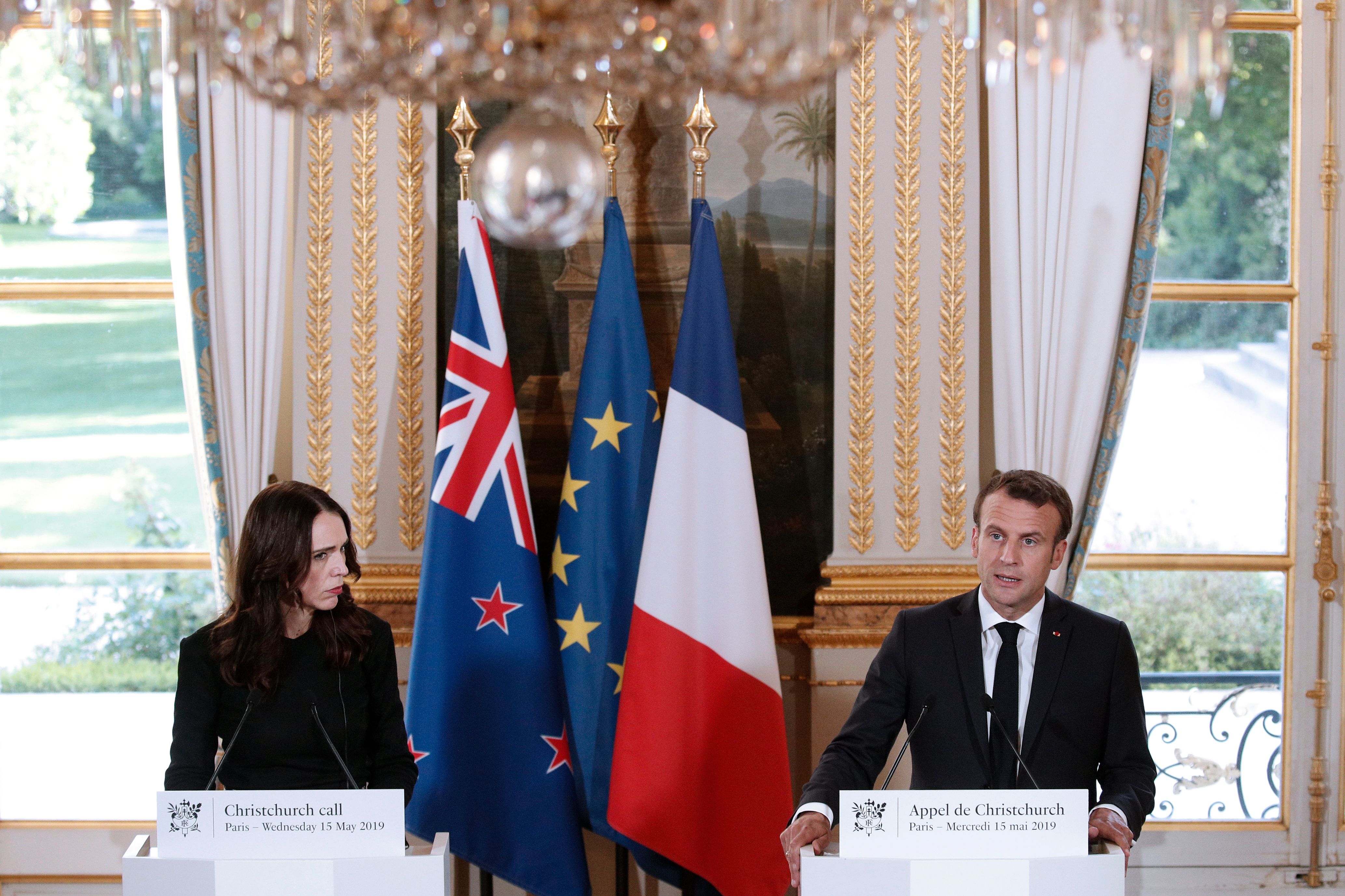New Zealand's Prime Minister Jacinda Ardern (L) and French President Emmanuel Macron (R) hold a press conference for the launch the global "Christchurch Call" initiative to tackle the spread of extremism online at the Elysee Palace in Paris on May 15, 2019. (Photo by YOAN VALAT / POOL / AFP) (Photo credit should read YOAN VALAT/AFP/Getty Images)