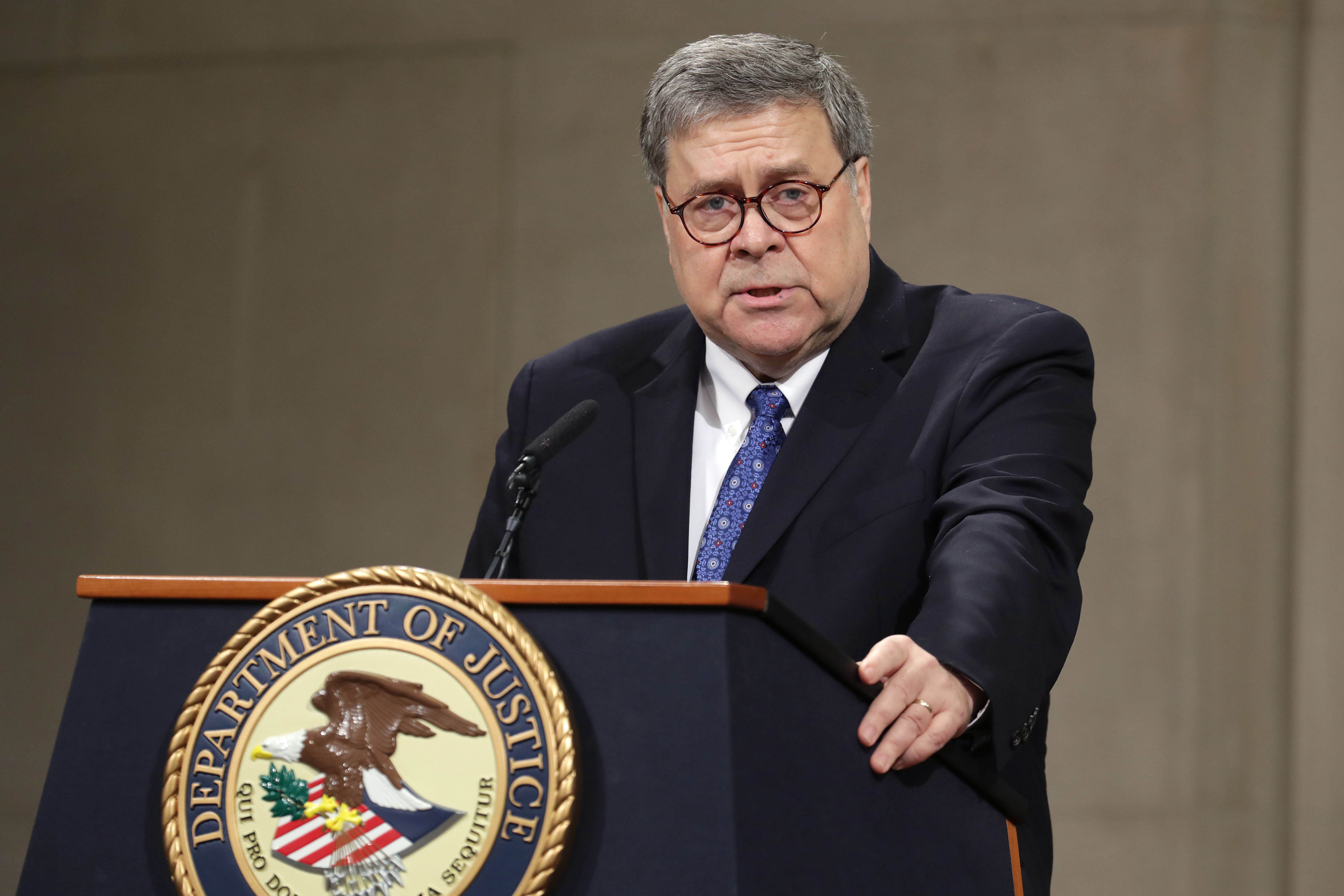 WASHINGTON, DC - MAY 09: U.S. Attorney General William Barr delivers remarks during a farewell ceremony for Deputy Attorney General Rod Rosenstein at the Robert F. Kennedy Main Justice Building May 09, 2019 in Washington, DC. Rosenstein, who has worked for the federal government for more than 29 years, will be most remembered for overseeing special counsel Robert Mueller's investigation into Russian interference in the 2018 presidential election. (Photo by Chip Somodevilla/Getty Images)