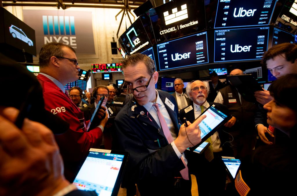 Traders work after the opening bell during the IPO of the ride sharing company Uber, at the New York Stock Exchange (NYSE) on May 10, 2019. CREDIT: JOHANNES EISELE/AFP/Getty Images.