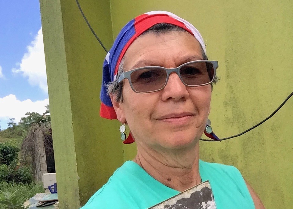 Edna Benitez, rebuilding a home in Miraflores. CREDIT: Edna Benitez