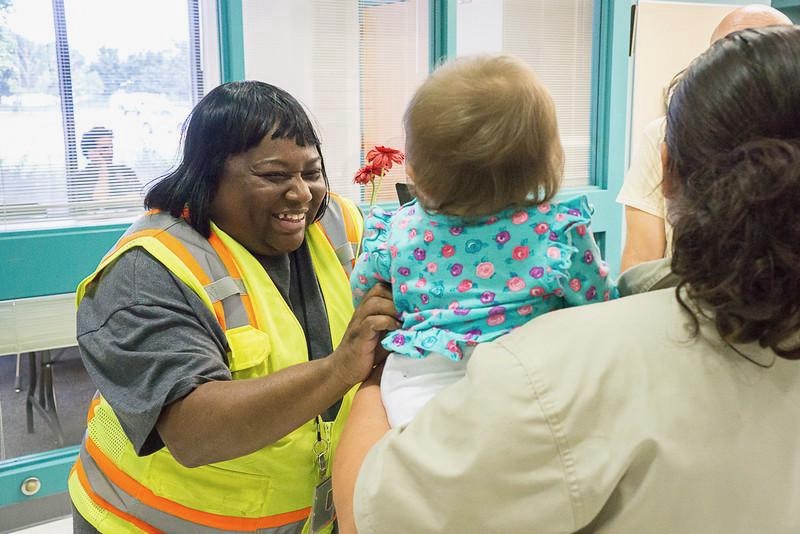 EPA staff speak to residents of the Superfund site. (Photo credit: Environmental Protection Agency)