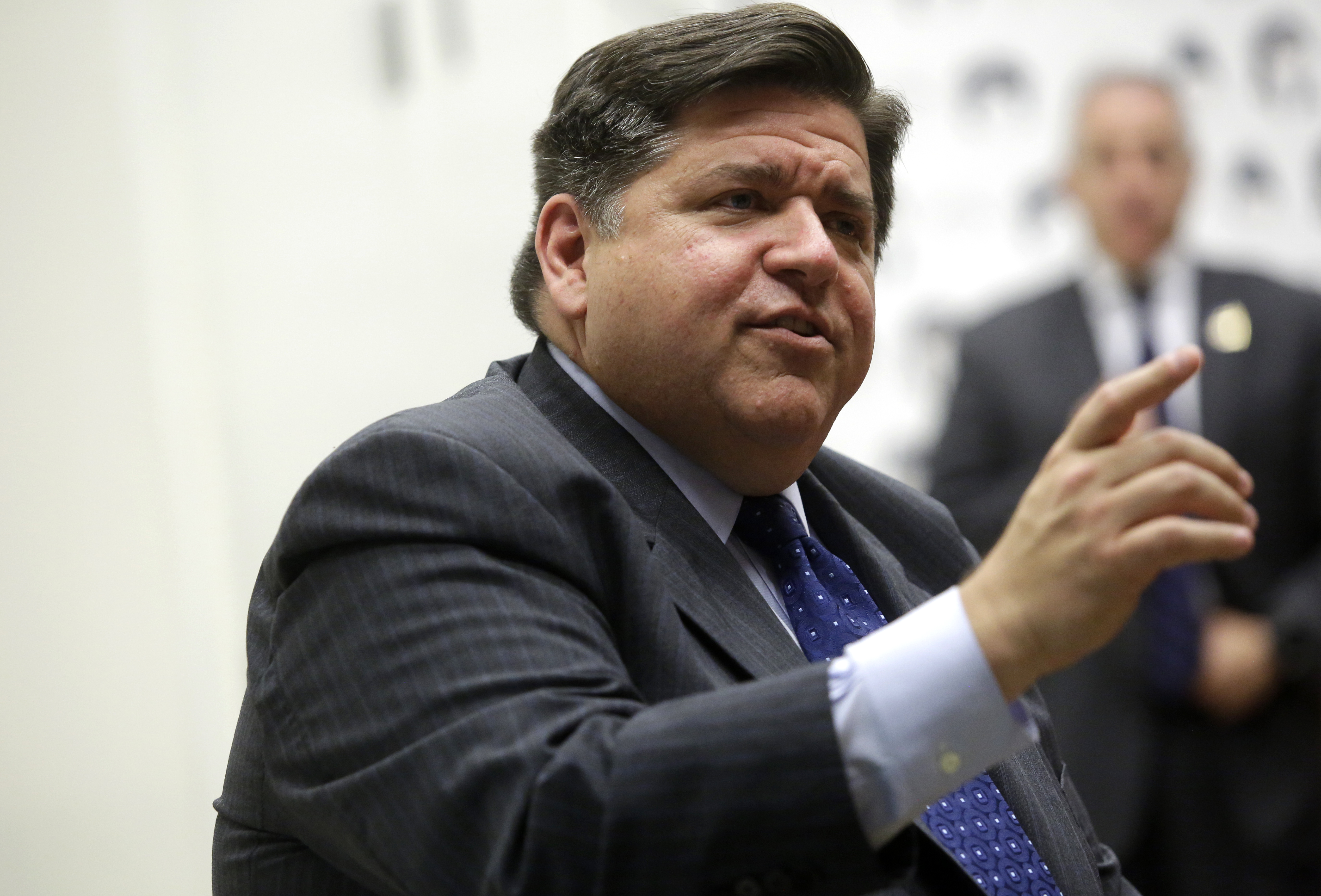 Illinois Gov. J.B. Pritzker recently signed a bill to legalize marijuana in Illinois into law. The law, which goes into effect next year has set a new benchmark for addressing the War On Drugs myriad social inequities. (Photo by Joshua Lott/Getty Images)