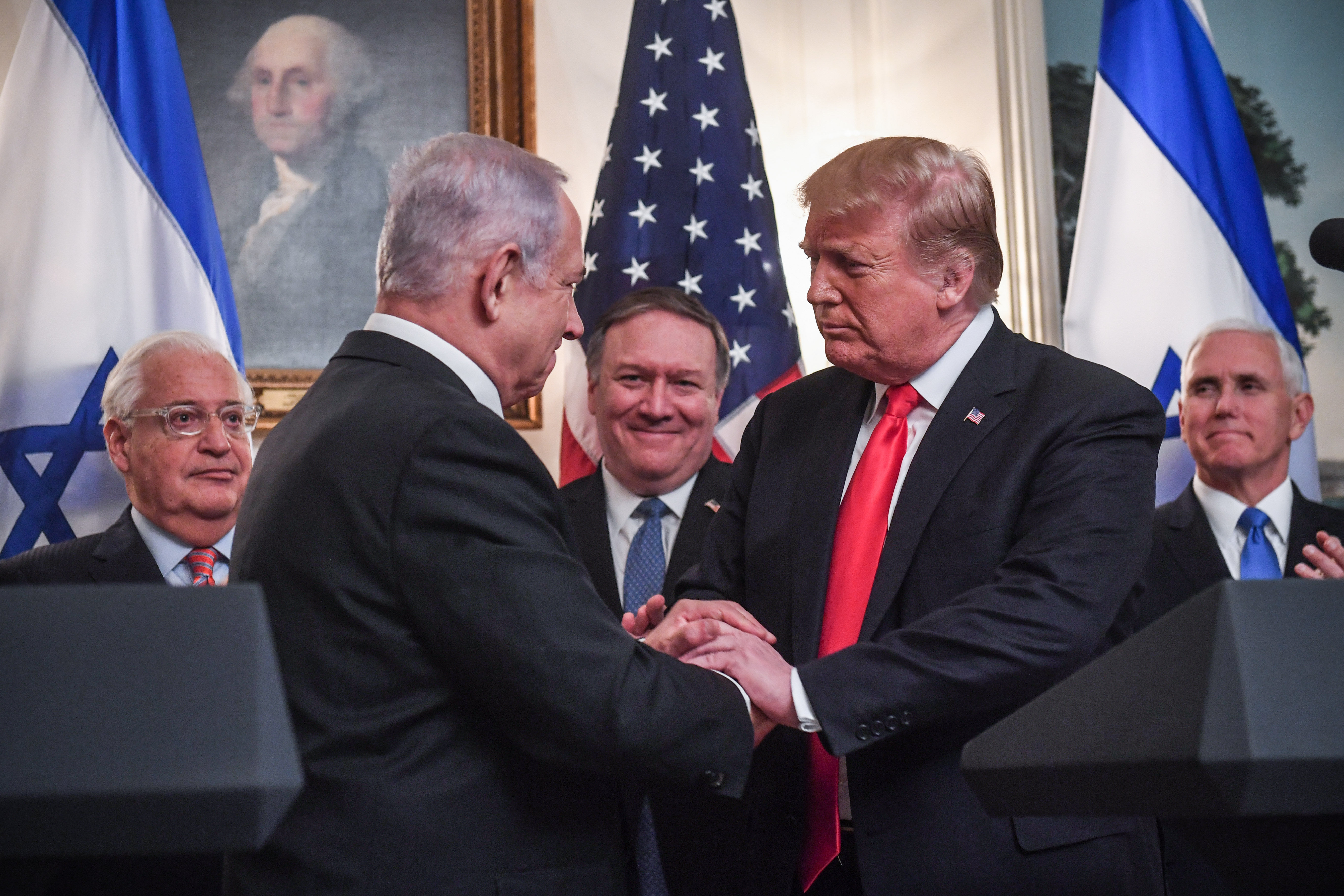 US President Donald Trump(R) shakes hands with Israeli Prime Minister Benjamin Netanyahu at the White House in Washington, DC, March 25, 2019. Credit: SAUL LOEB / AFP