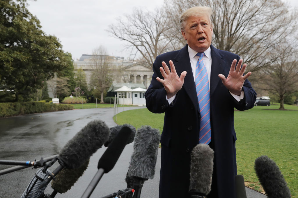 President Donald Trump tries to deflect blame for the U.S.-Mexico border situation onto Democrats. (Photo credit: Chip Somodevilla/Getty Images)