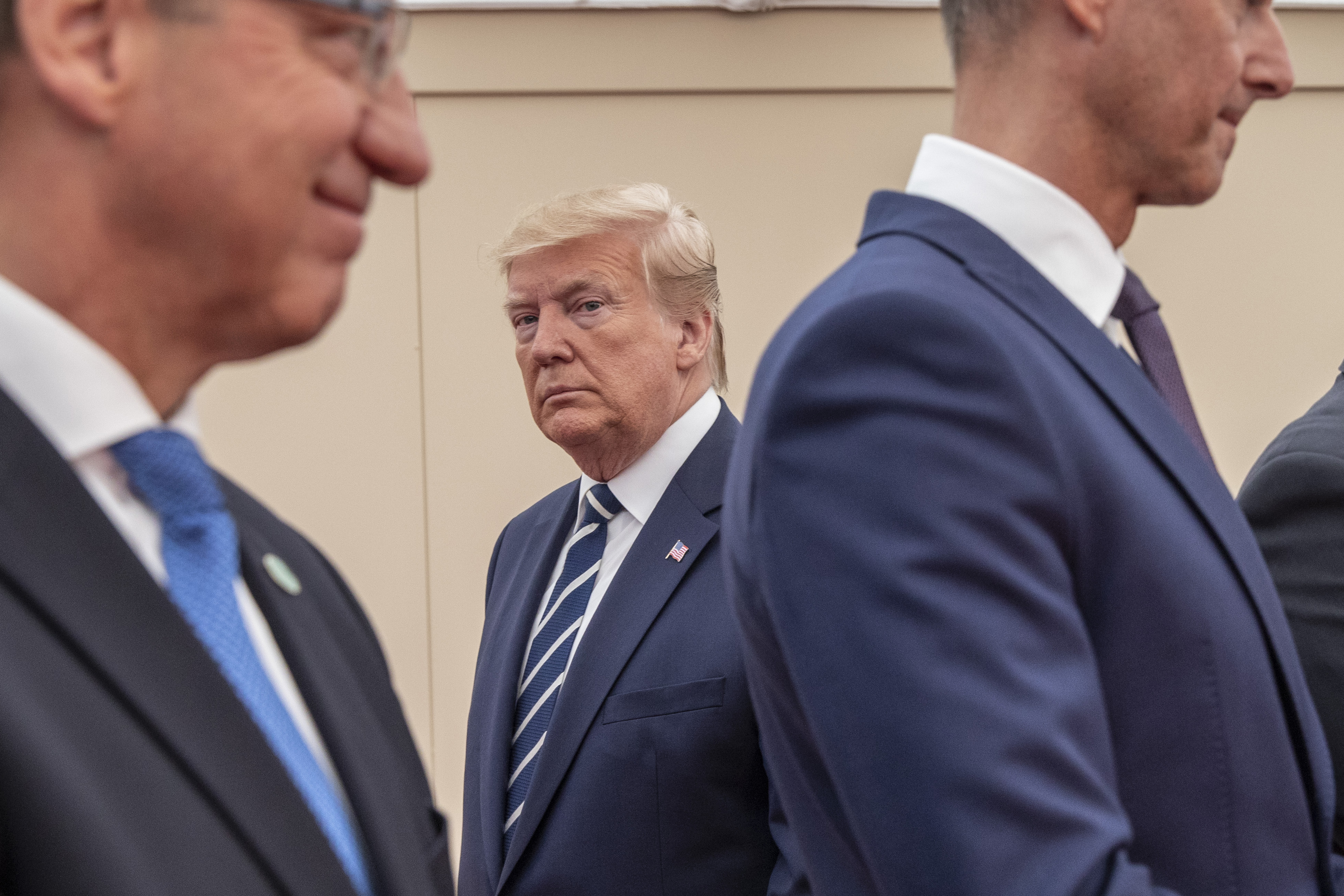 President Donald Trump meets world leaders ahead of the National Commemorative Event commemorating the 75th anniversary of the D-Day invasion on June 5, 2019 in Portsmouth, England. CREDIT: Jack Hill/WPA/ Pool/Getty Images.