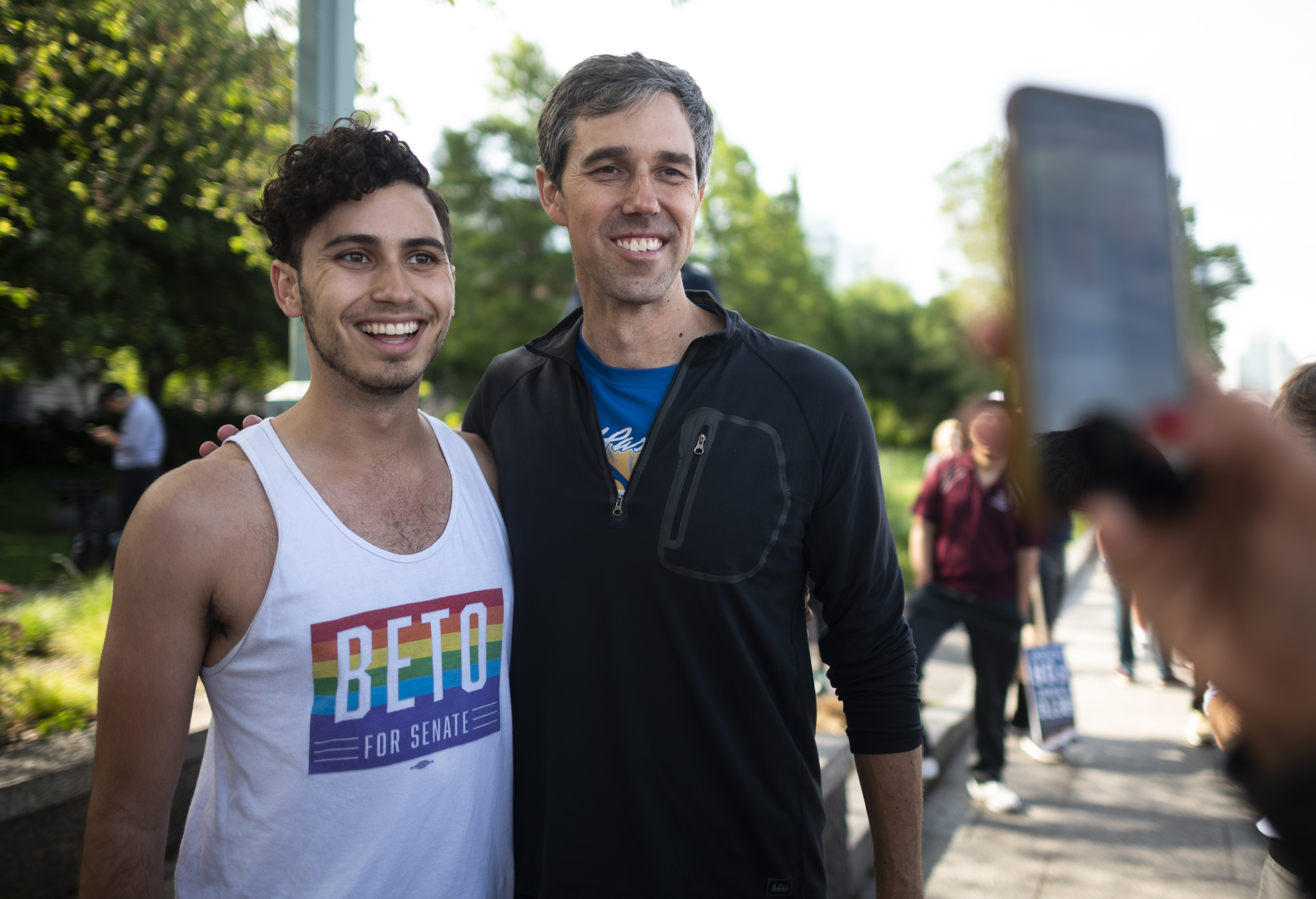 Democratic presidential candidate and former Texas congressman Beto O'Rourke poses for pictures after running with members of the LGBTQ community a two miles Pride run in New York City on June 12, 2019. CREDIT: EISELE/AFP/Getty Images