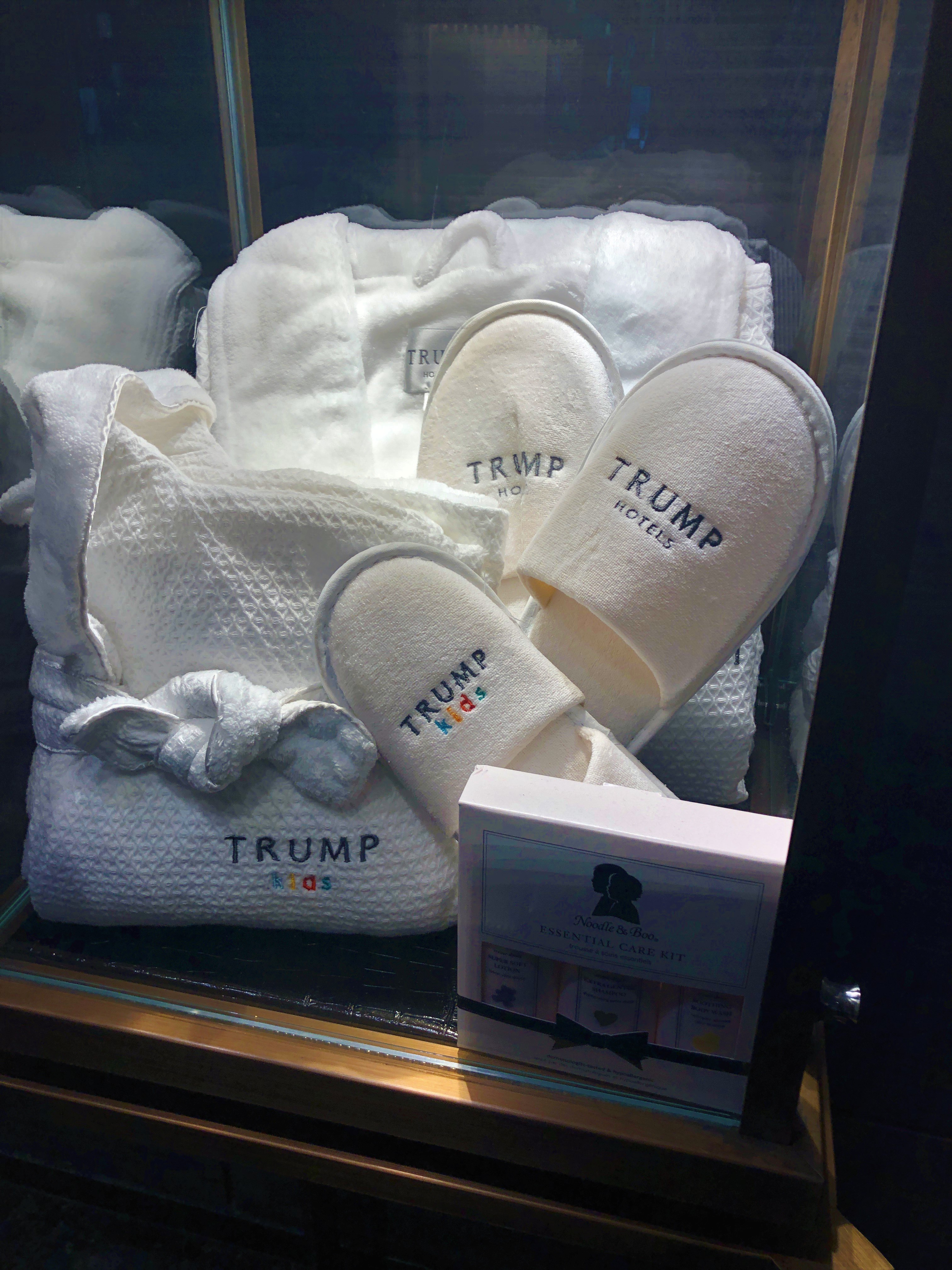 Some of the Trump-branded bathrobes and slippers on display in the Trump Tower Vancouver property's lobby. CREDIT: CASEY MICHEL