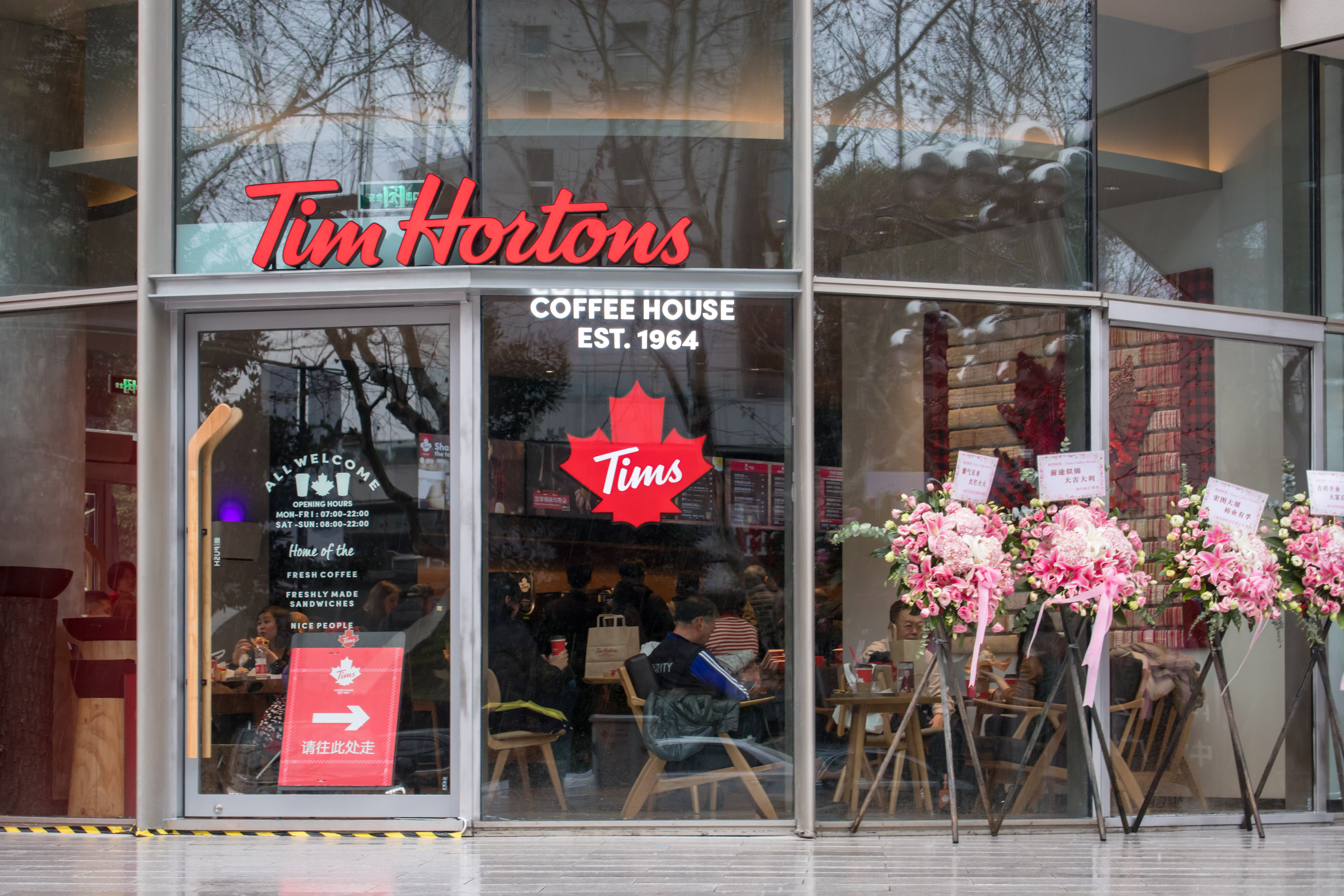 Customers eat at a Tim Hortons coffee house of the Central Plaza on February 27, 2019. Credit: Wang Gang/VCG via Getty Images
